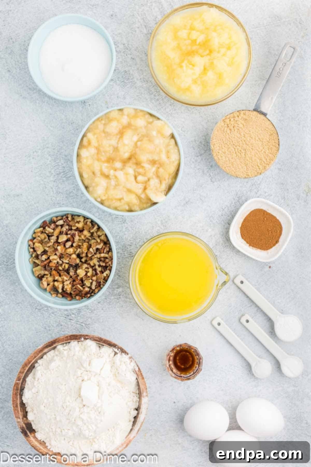 Tropical Banana Pineapple Loaf 3 Assortment of ingredients for Banana Pineapple Bread, including flour, sugars, spices, butter, eggs, pineapple, and bananas.