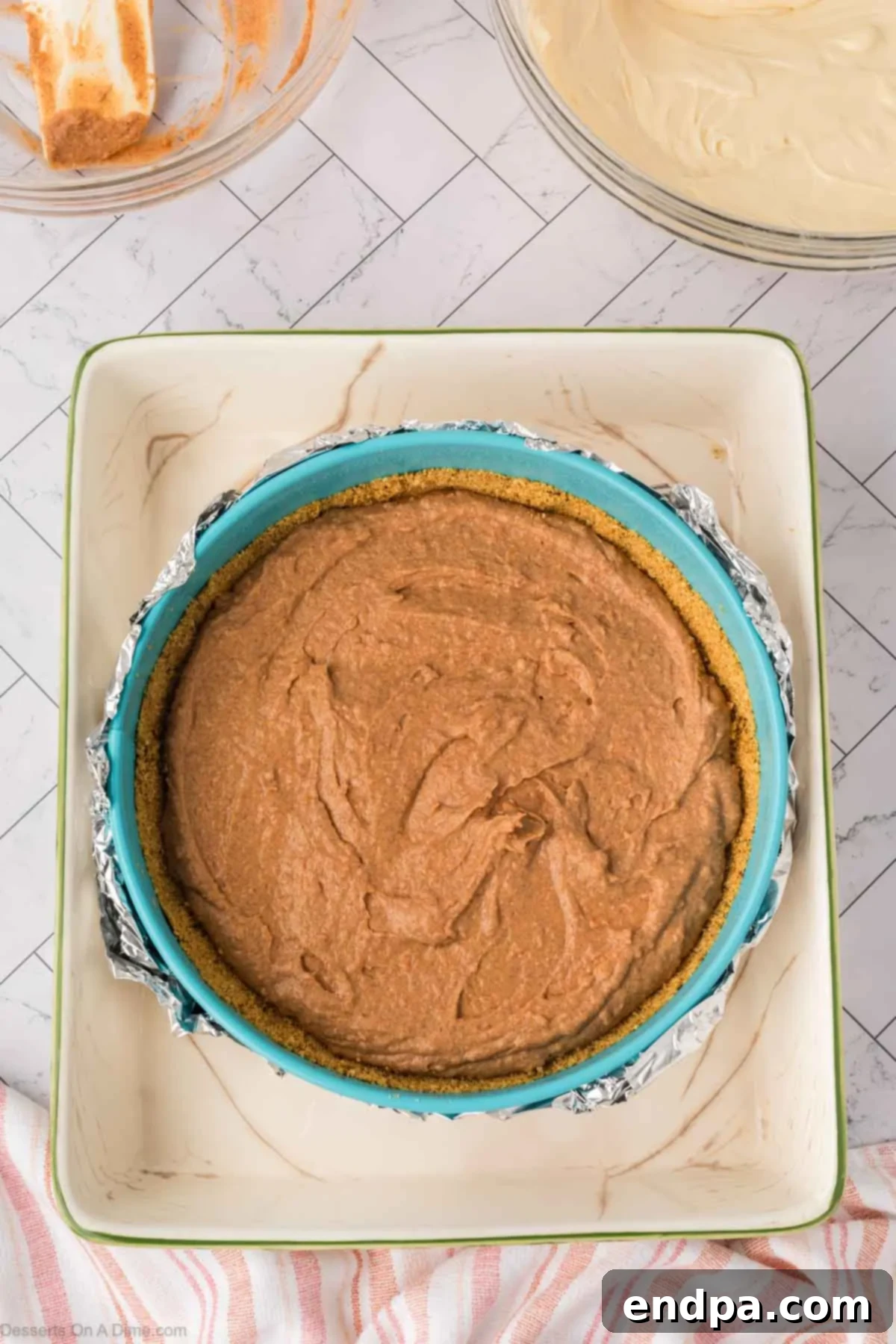 Velvet Sweet Potato Cheesecake 15 Cheesecake layers in the pan, ready for marbling and baking.