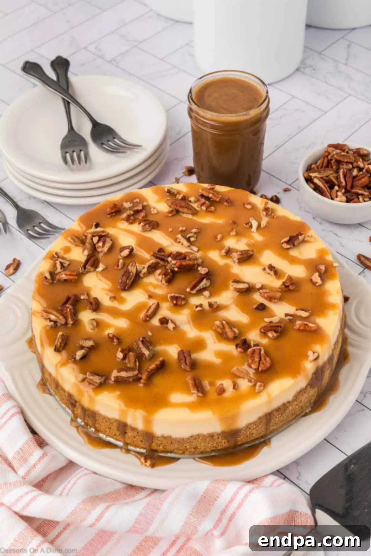 Velvet Sweet Potato Cheesecake 20 Sweet potato cheesecake generously topped with salted caramel sauce and chopped pecans.