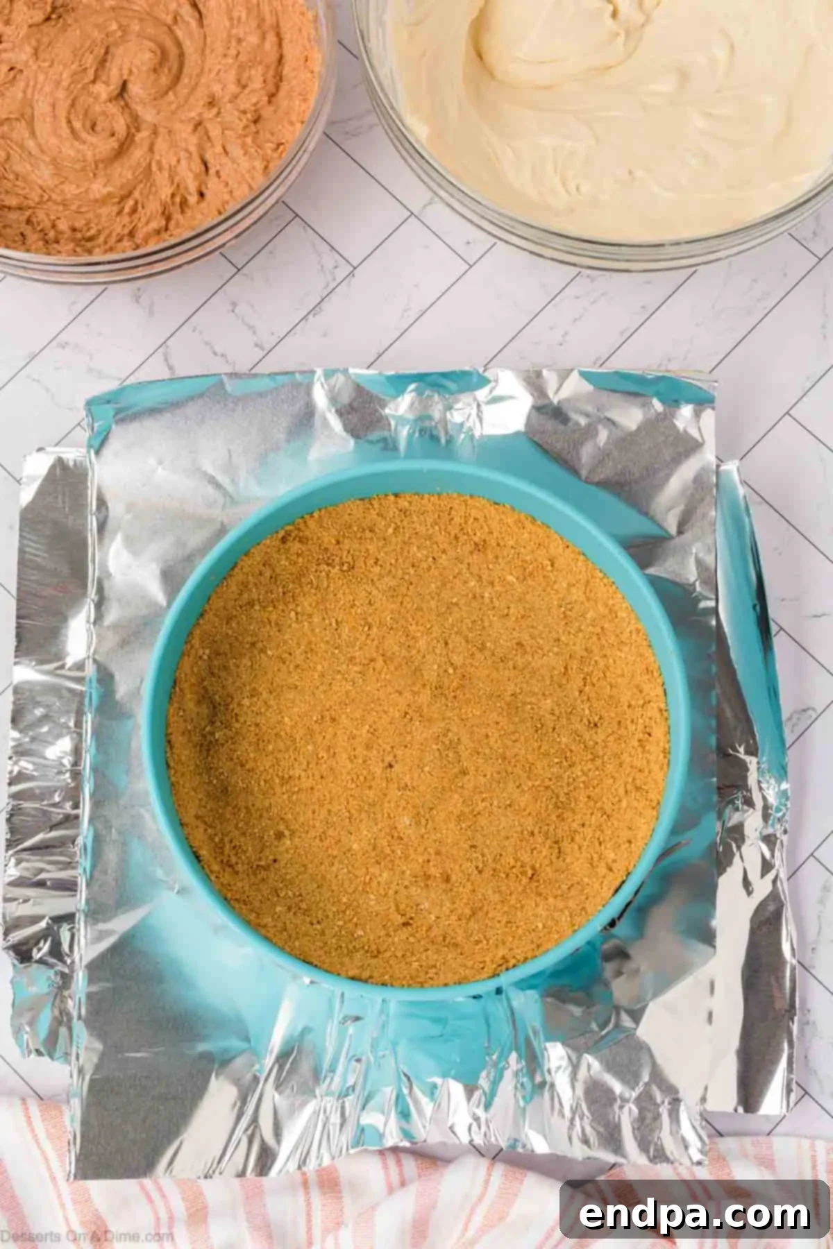 Velvet Sweet Potato Cheesecake 8 Graham cracker crust pressed into a springform pan.