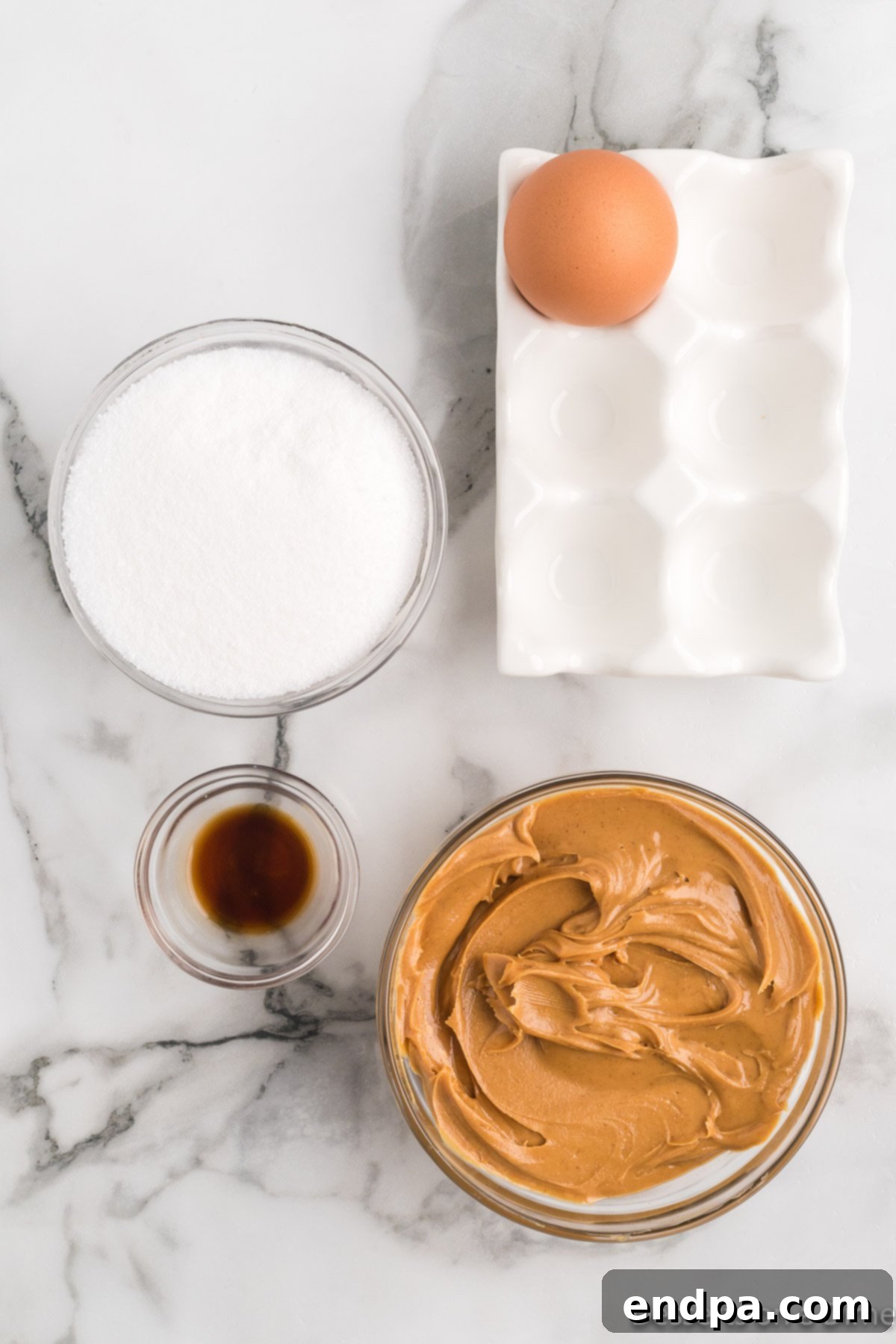 Decadent Keto Peanut Butter Cookies 3 Key ingredients for Keto Peanut Butter Cookies: creamy peanut butter, granulated Swerve sweetener, vanilla extract, and one large egg.