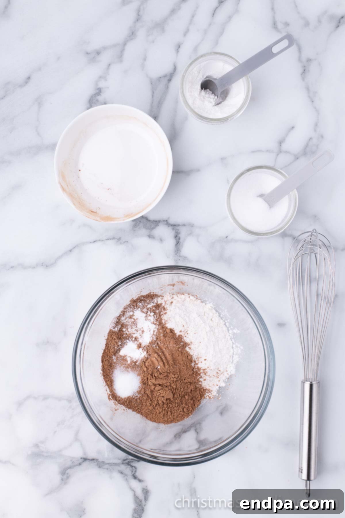 Mixing bowl with cocoa powder, flour, baking powder and salt. 