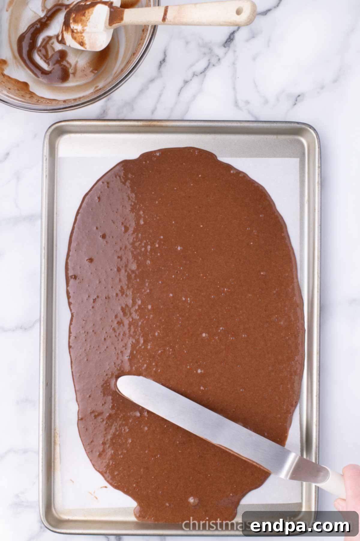 Batter spread on baking sheet. 