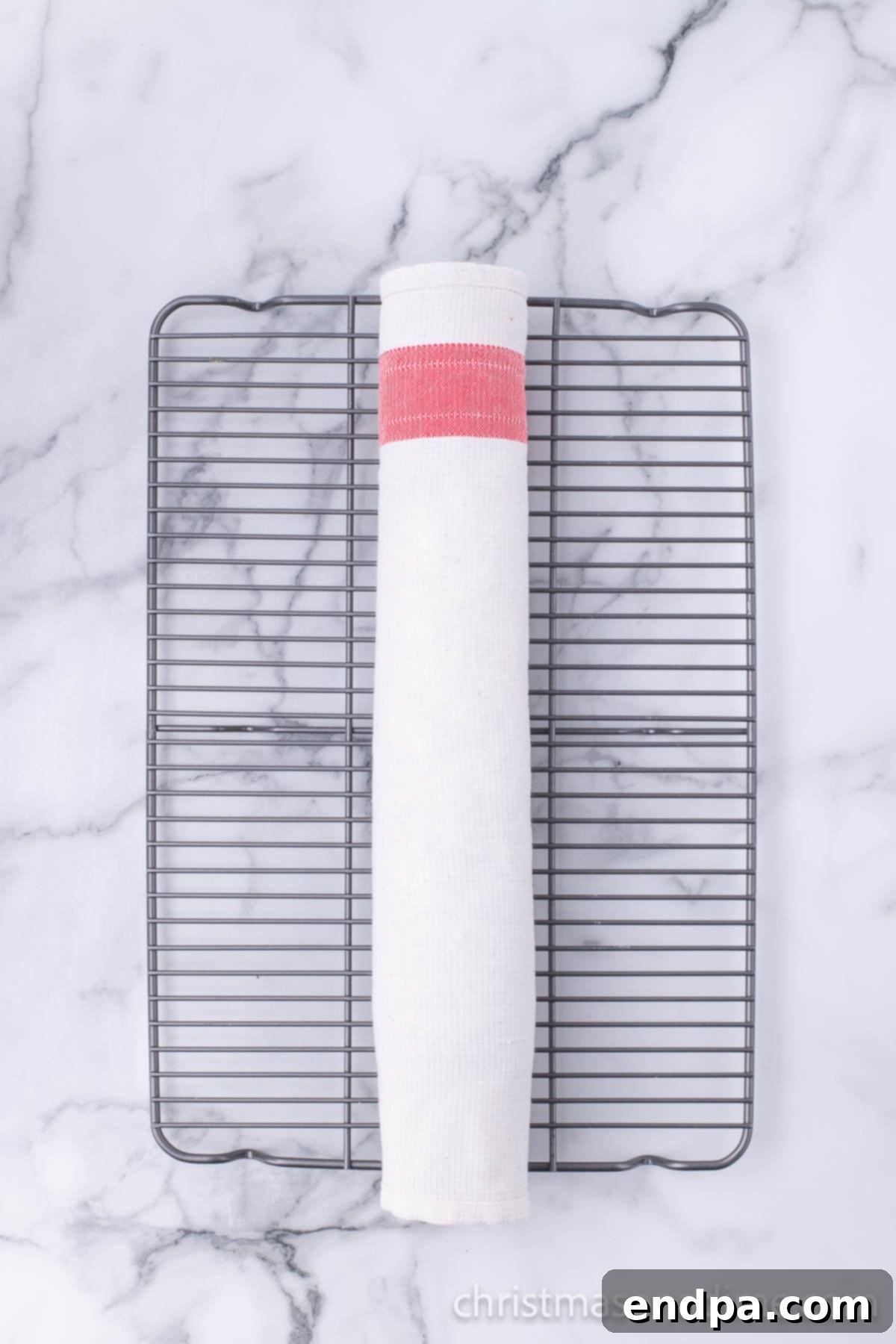 Cake rolled up in towel. 