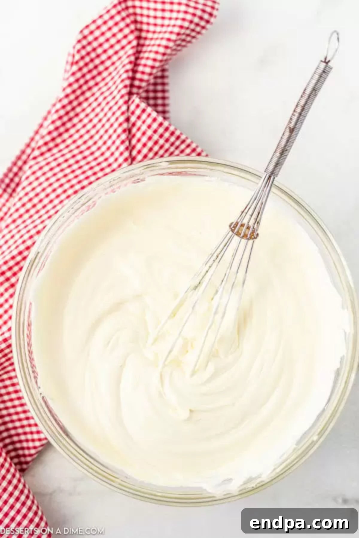 Whipped cream mixture combined together with the pudding for Christmas dirt cups.