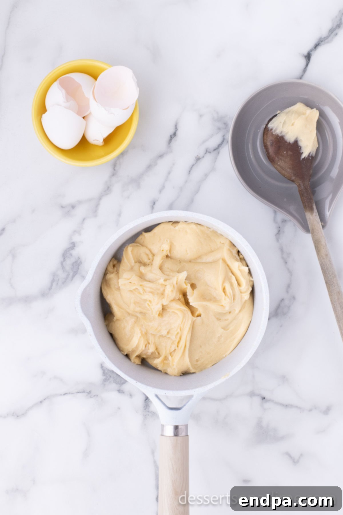 Dough combined into saucepan. 