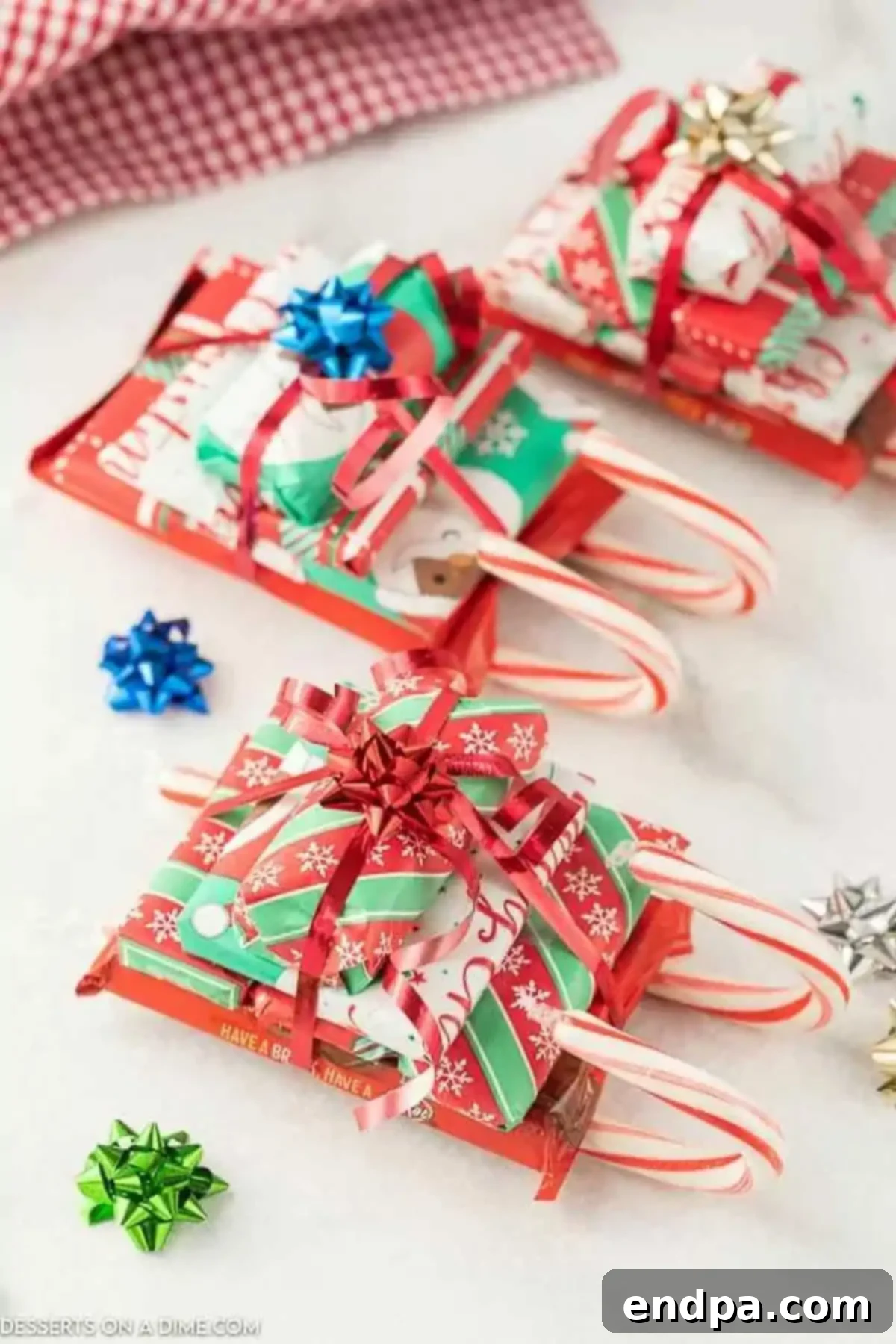 Photo of multiple chocolate candy cane sleighs displayed together.