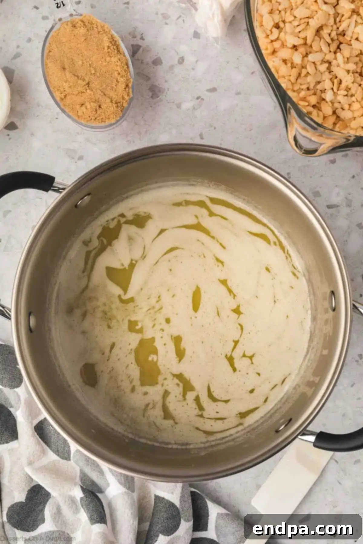 Saucepan with melted butter.