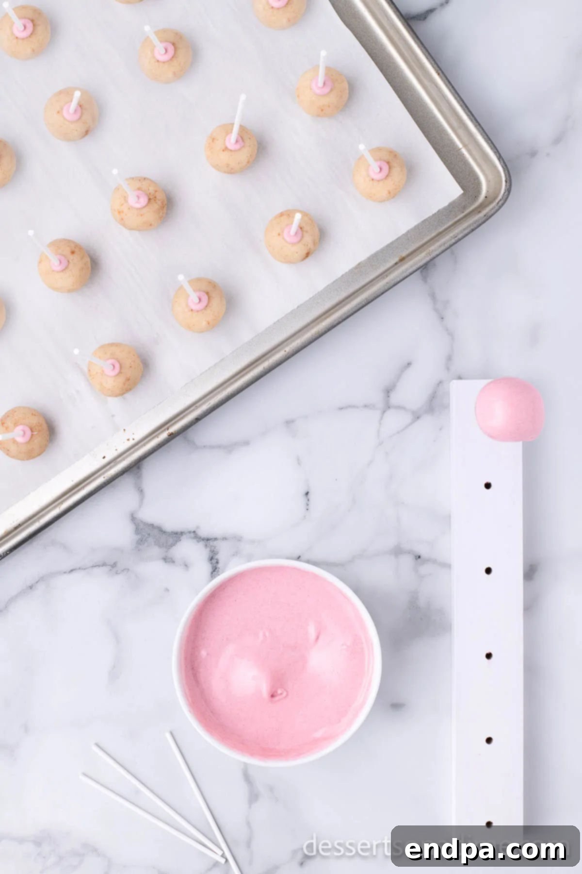 Copycat Starbucks Cake Pops 13 Dipped cake pops drying in a Styrofoam block.