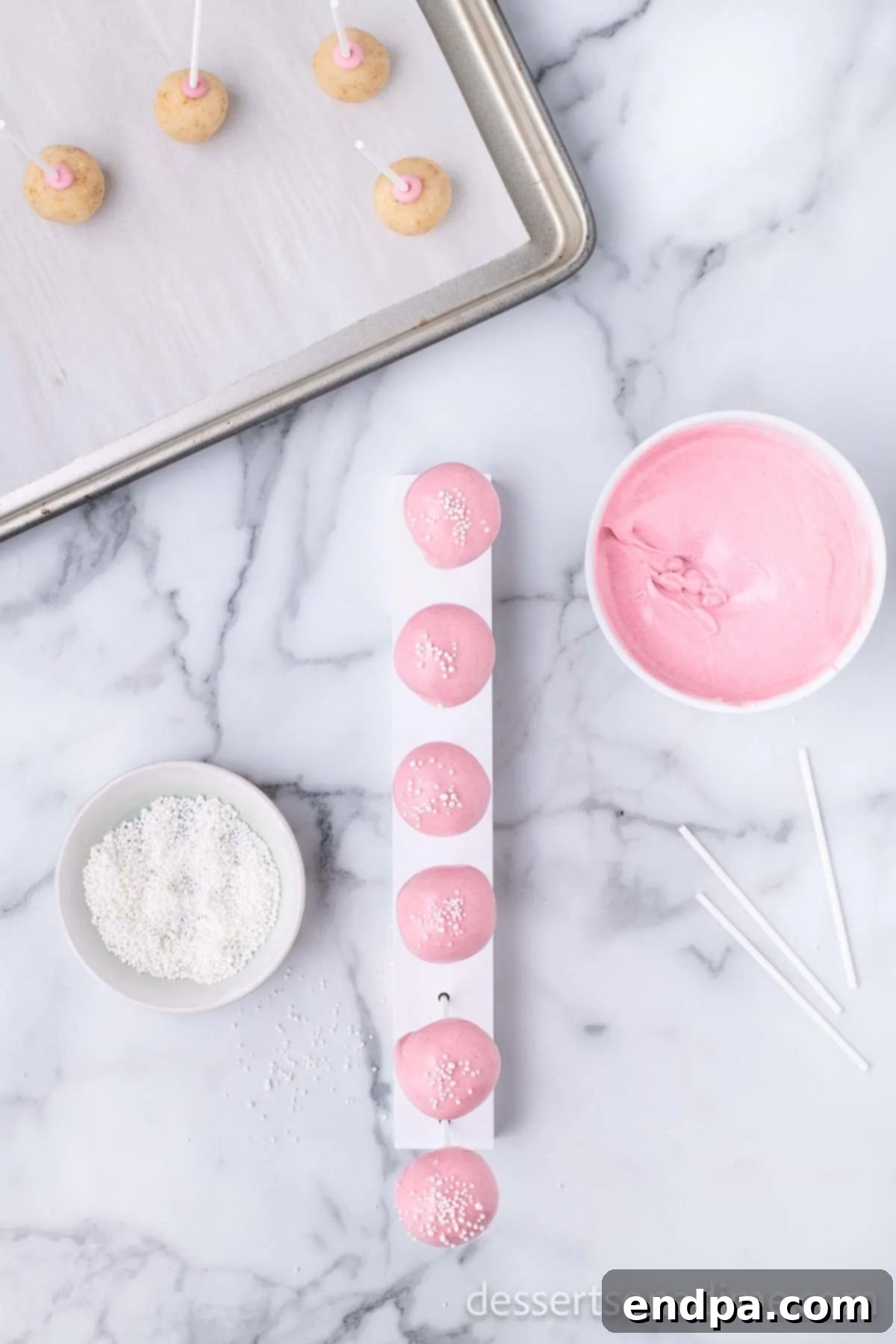 Copycat Starbucks Cake Pops 14 Several finished cake pops drying in a stand.