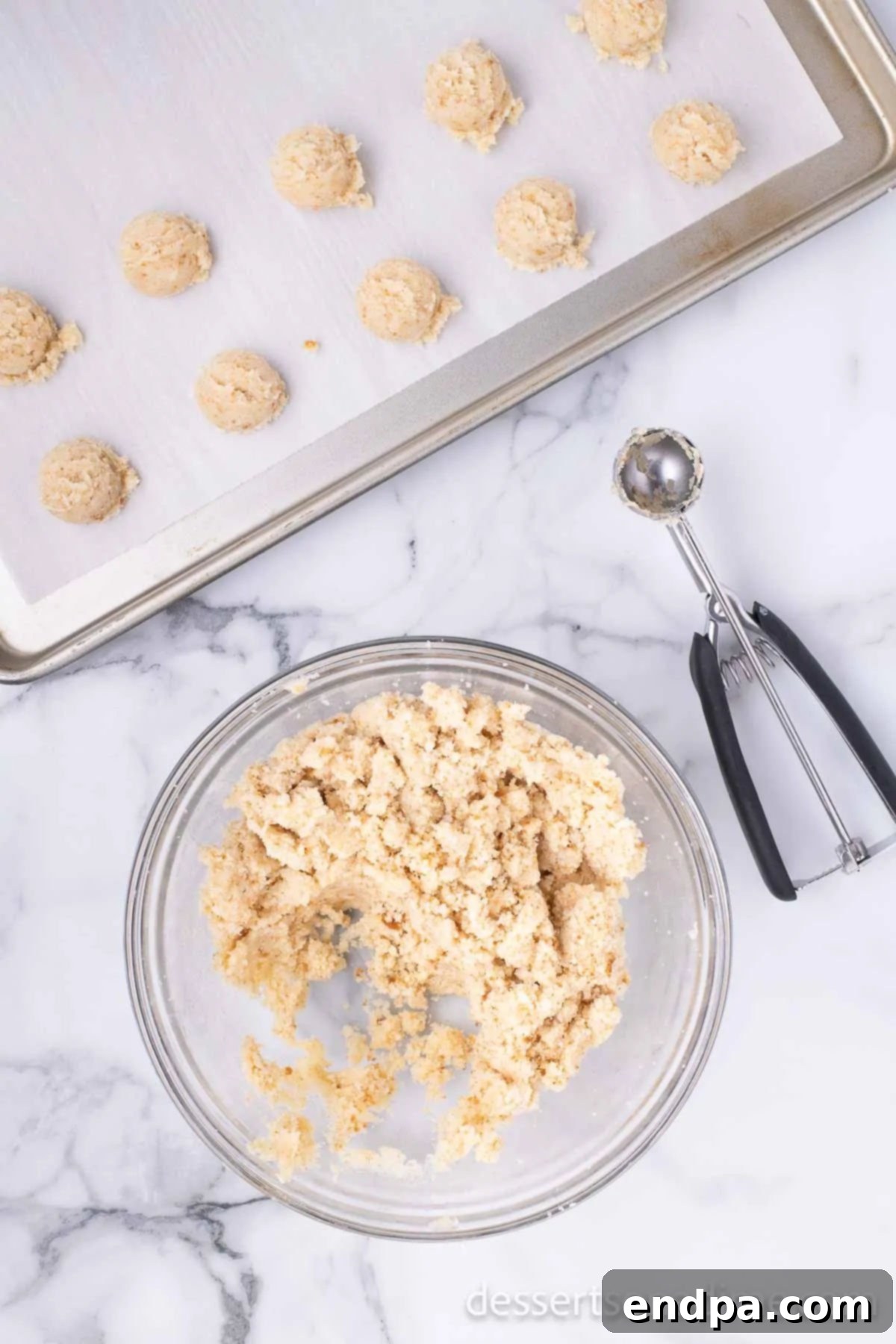 Copycat Starbucks Cake Pops 9 Mixing bowl with cake and frosting combined into a dough-like mixture.