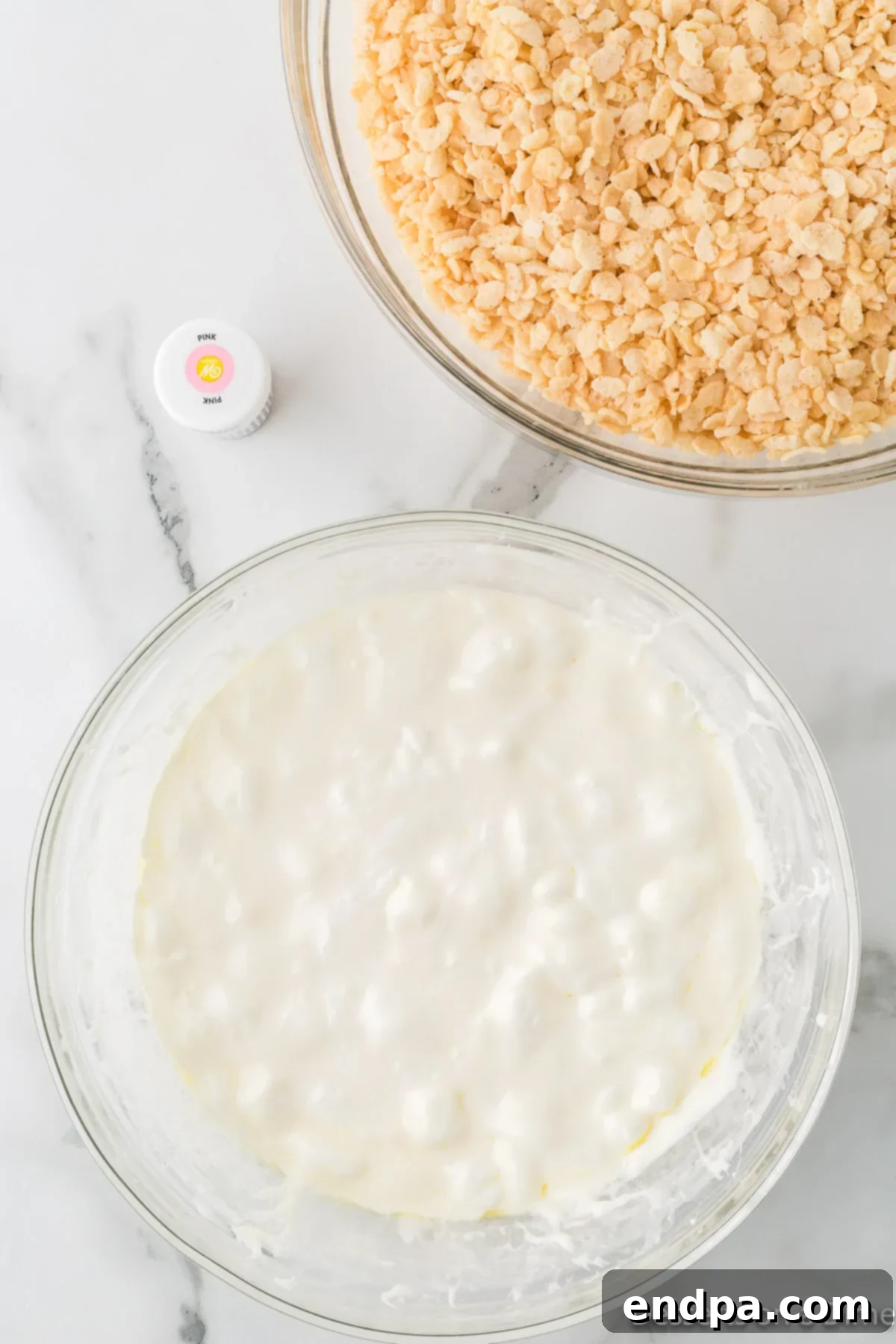 Sweetheart Crispy Treats 4 Mixing bowl with melted marshmallows and butter. The gooey, melted marshmallow and butter mixture ready for coloring.