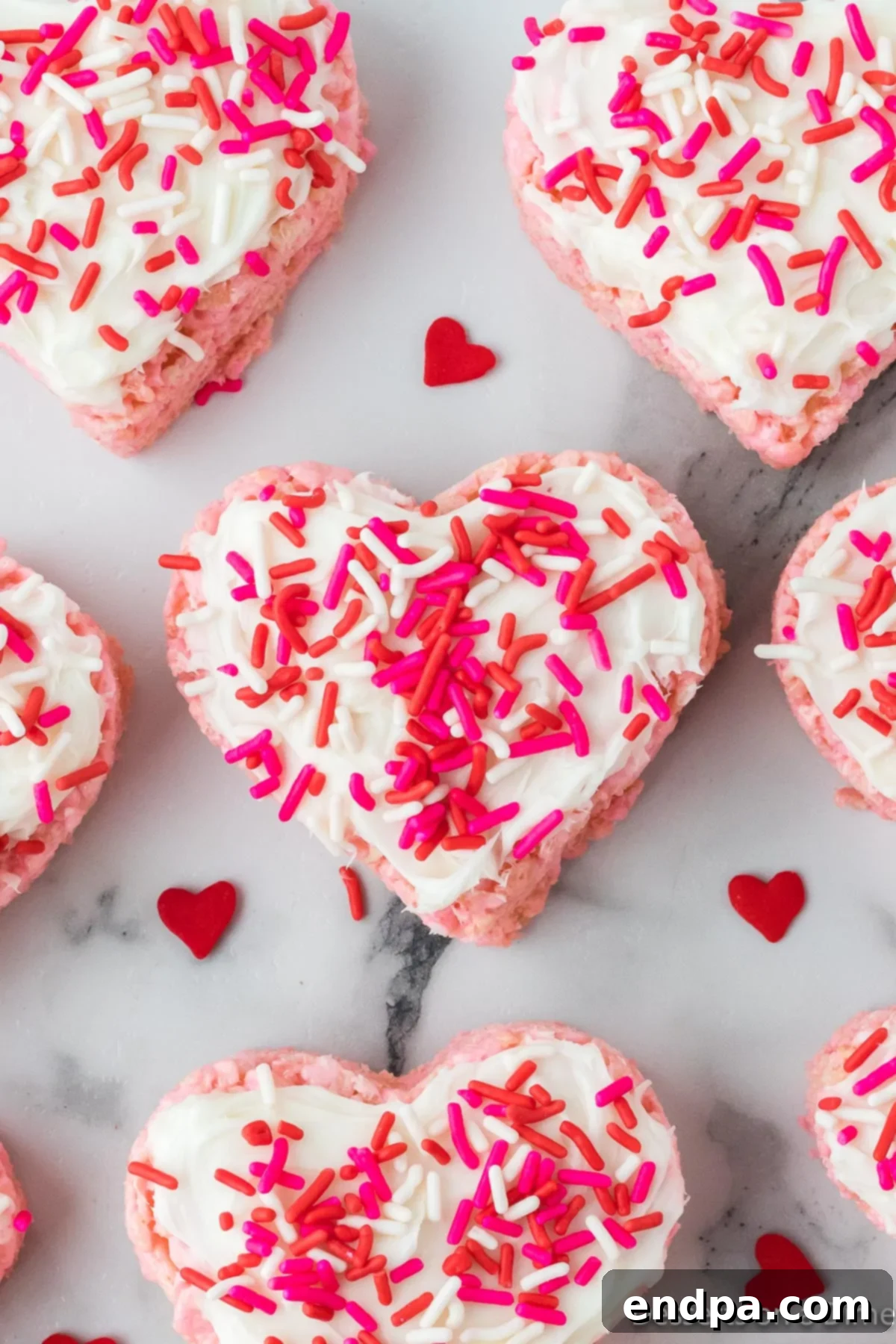 Sweetheart Crispy Treats 9 Sprinkles added to each one. Valentine Rice Krispie treats adorned with colorful sprinkles.