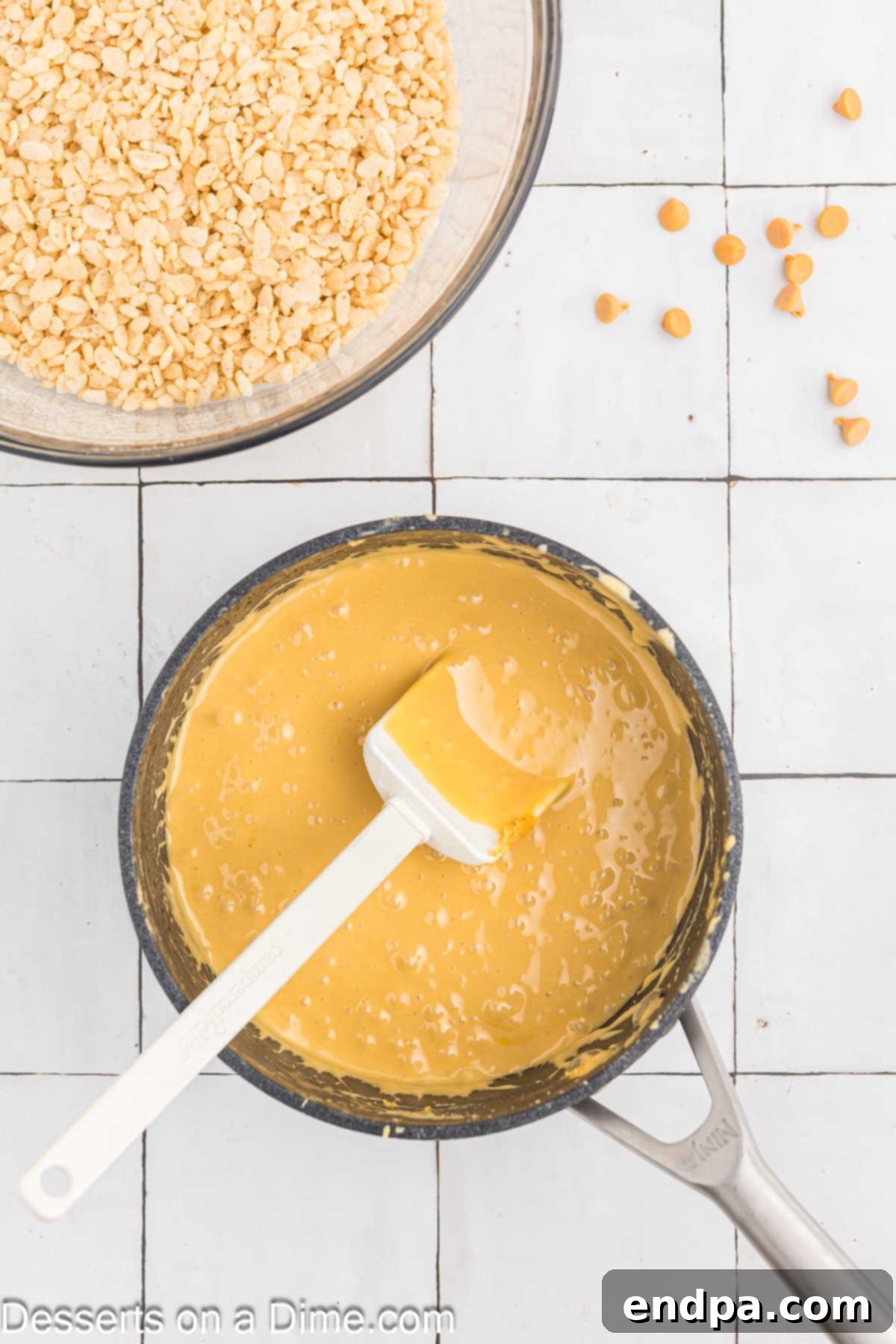 Salted butter melting in a small saucepan over medium-low heat, starting to foam.