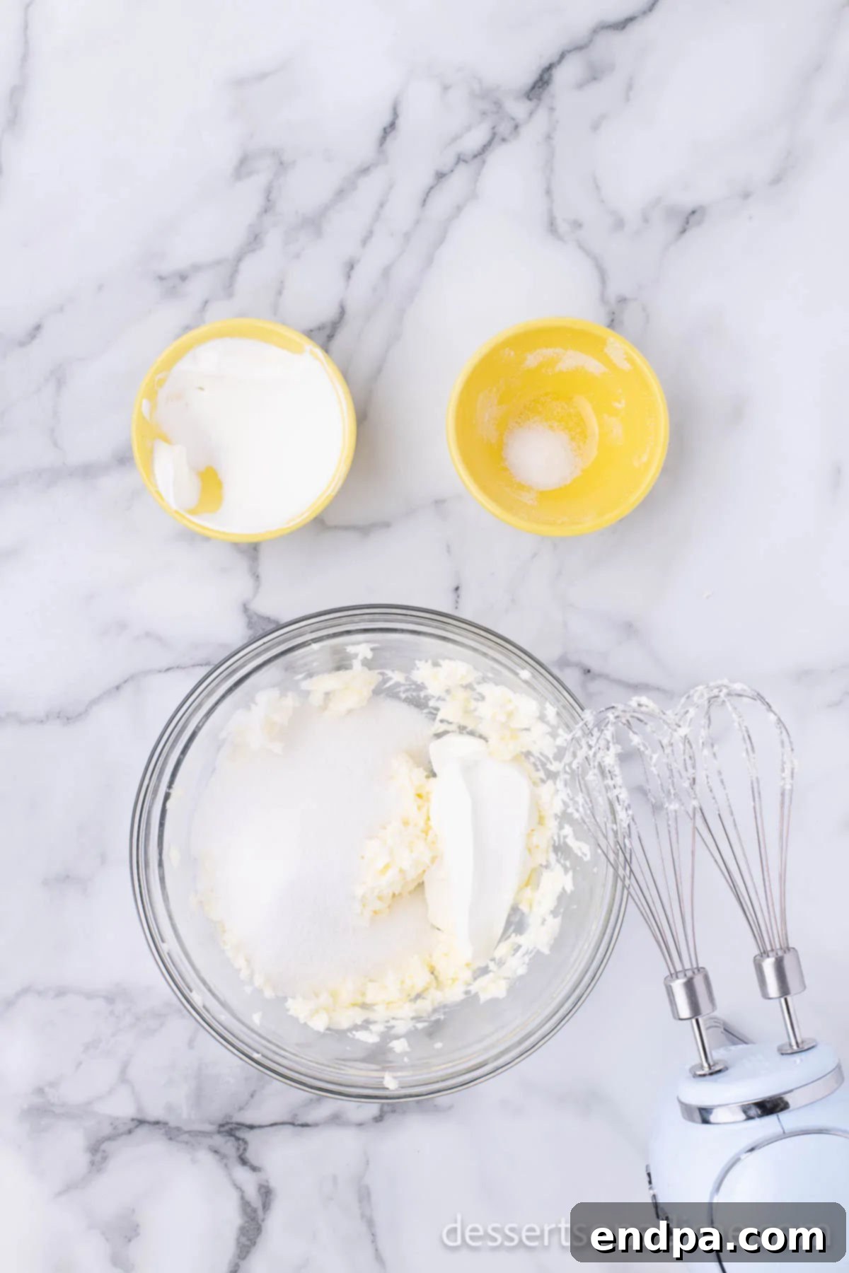 Starbucks Famous Lemon Loaf At Home 4 Mixing bowl with softened butter and granulated sugar, being creamed together.