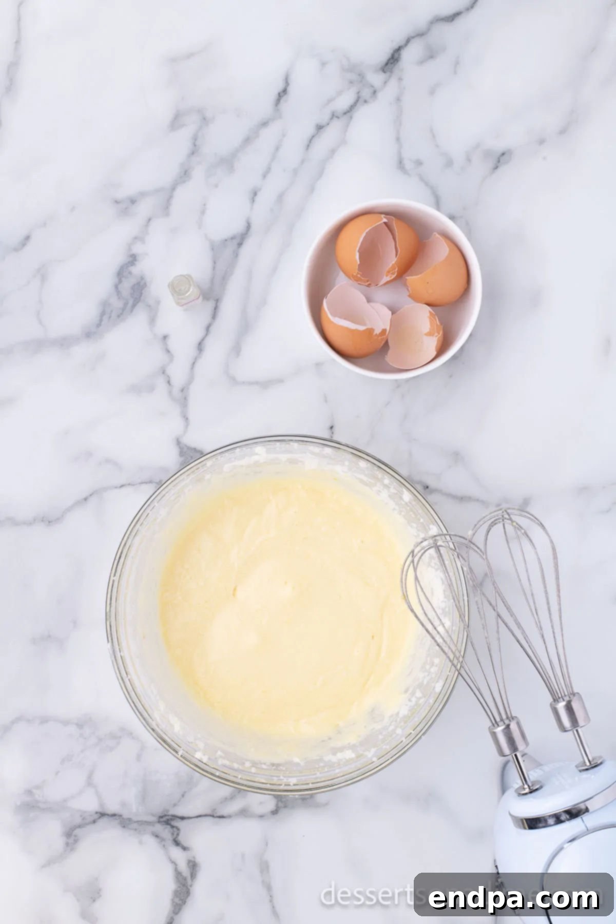 Starbucks Famous Lemon Loaf At Home 5 Separate mixing bowl with three large eggs, ready to be added to the butter mixture.
