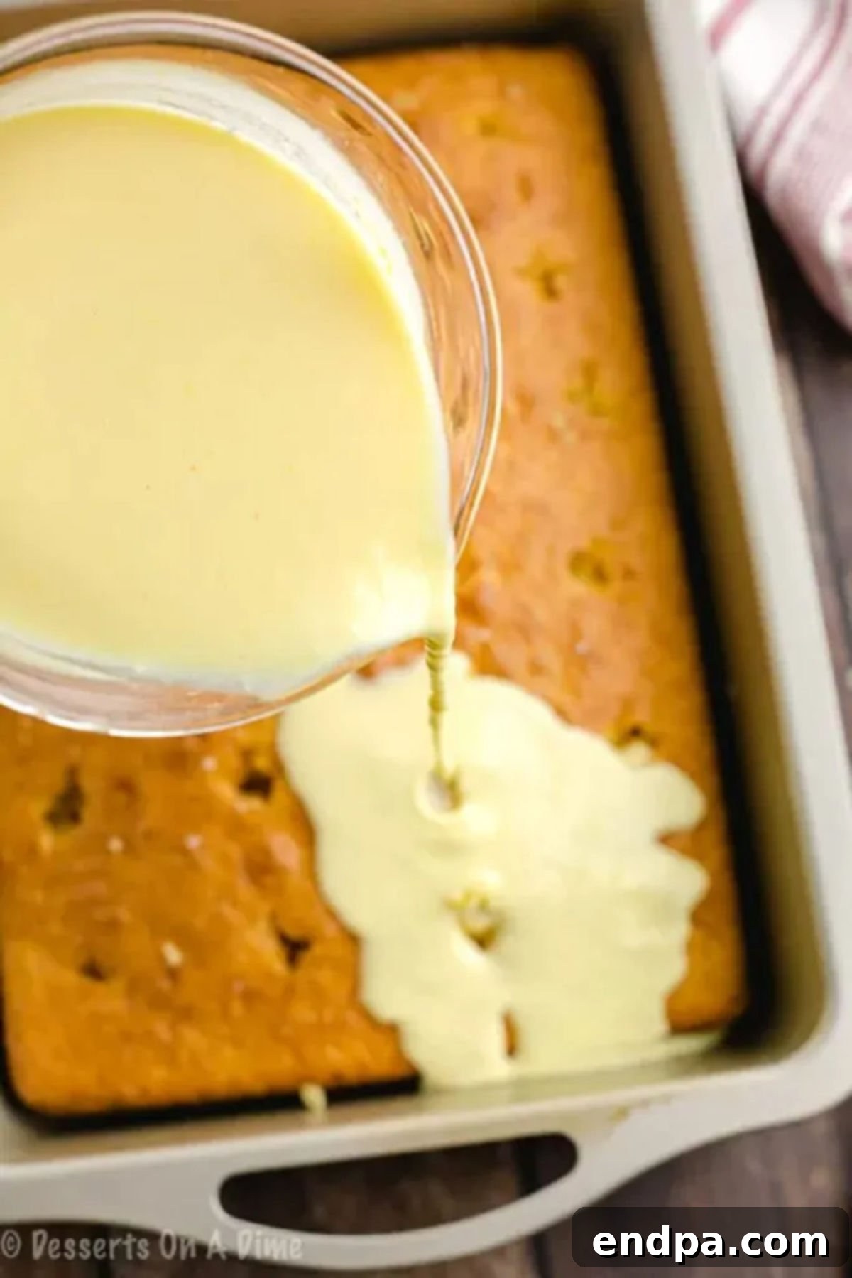 Pudding poured over the cake. 