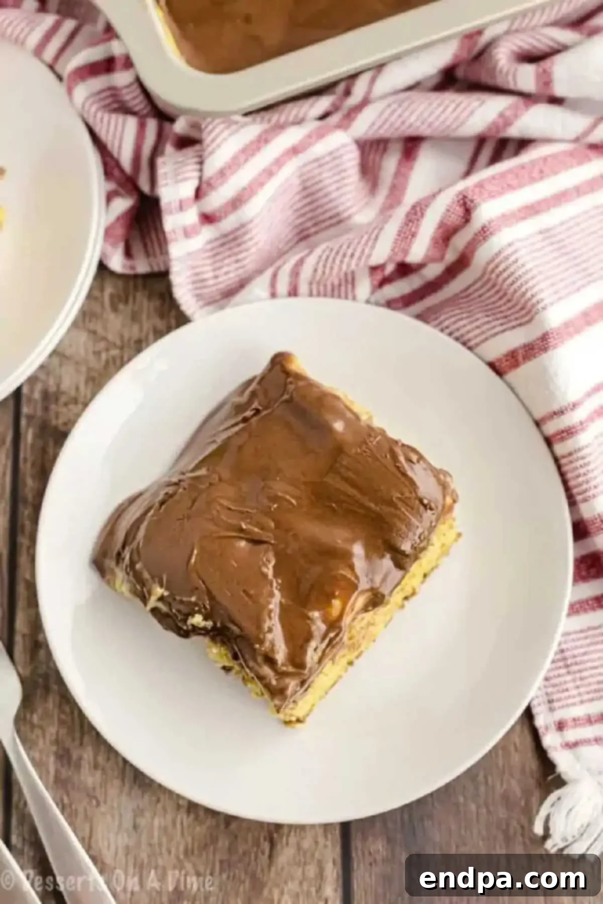 Slice of cake served on a plate. 