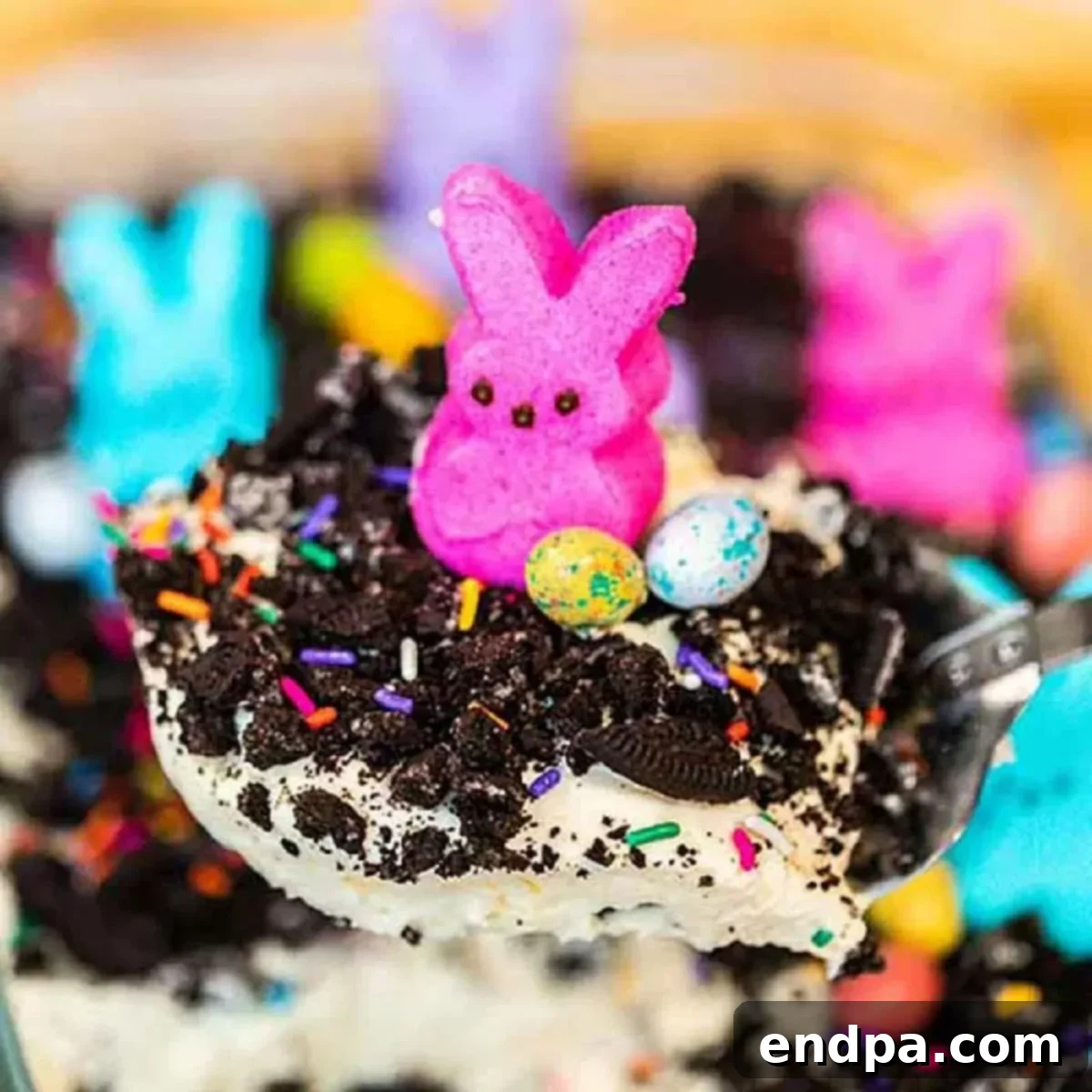 Spring Garden Dirt Cake 8 Beautifully decorated Easter Dirt Cake in a pan, ready to serve.