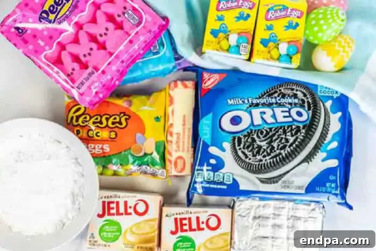 Easter dirt cake is an easy and delicious no bake treat perfect for dessert on Easter. This fun dessert is decorated with Easter peeps, candy and more. Ingredients for recipe - oreo cookies, cream cheese, powdered sugar, cool whip, pudding, easter candy for Easter Dirt Cake.