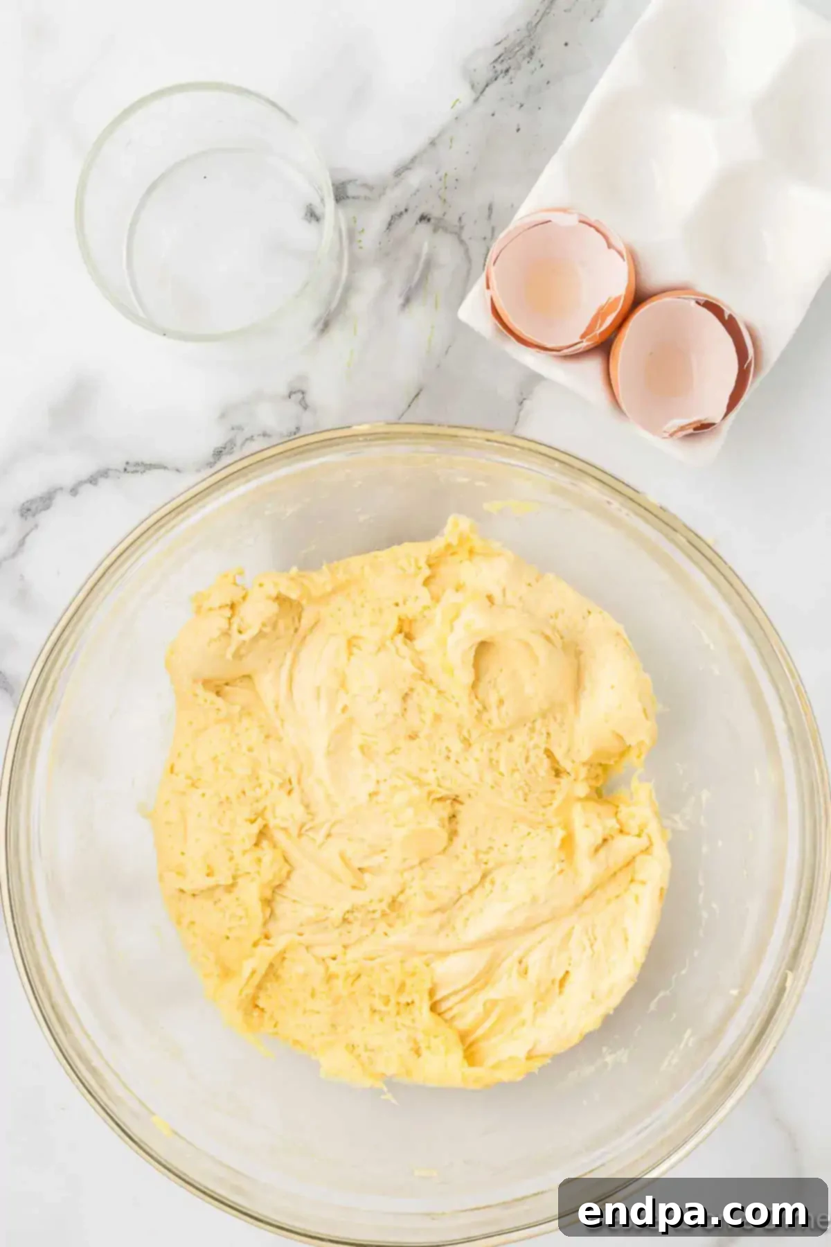 Thick cookie dough mixture in a bowl after being combined.