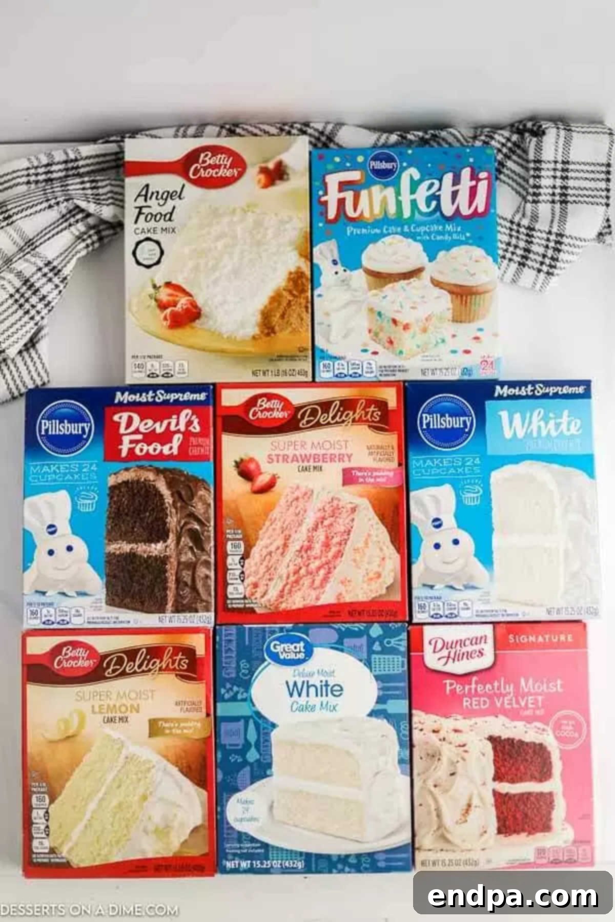 How Long Does Cake Mix Last 2 Various boxes of cake mix, neatly stacked, signaling readiness for baking a delicious cake.