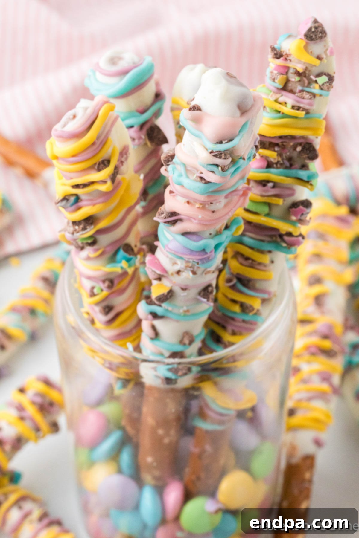 Pretzel rods in a glass. 