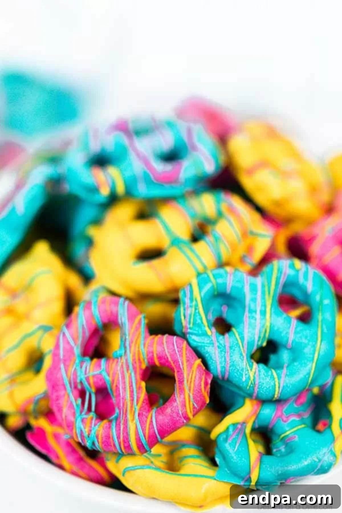A bowl of easter chocolate covered pretzel