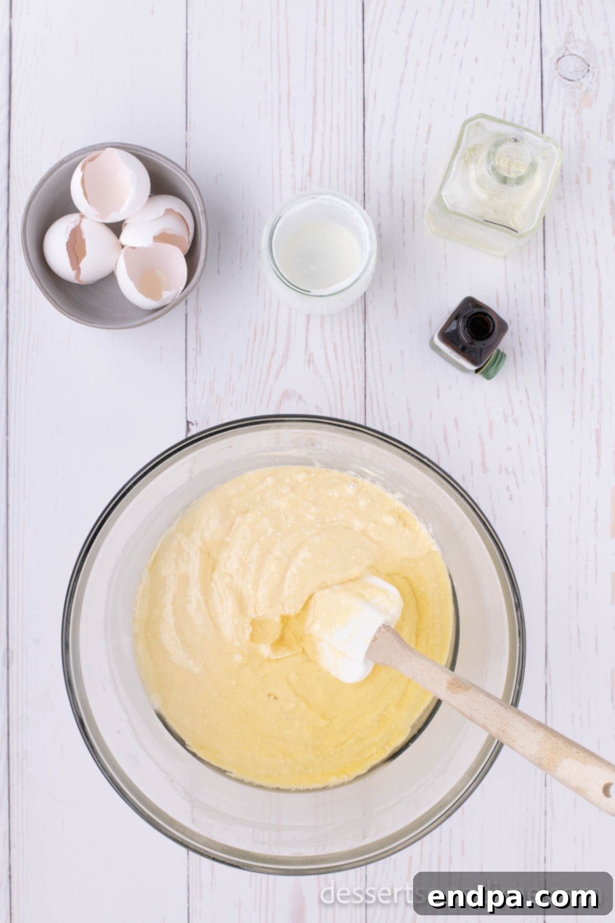 Mixing bowl with cake mix ingredients combined.