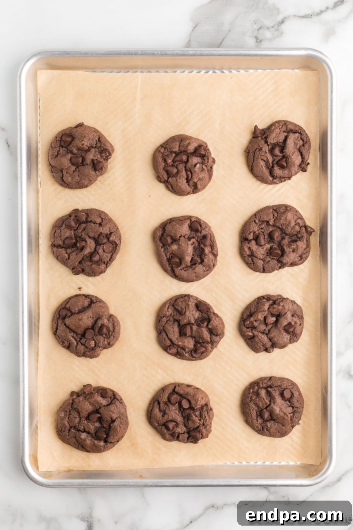 Fudgy Chocolate Cake Mix Cookies 8 Cookies baked and cooling on pan.