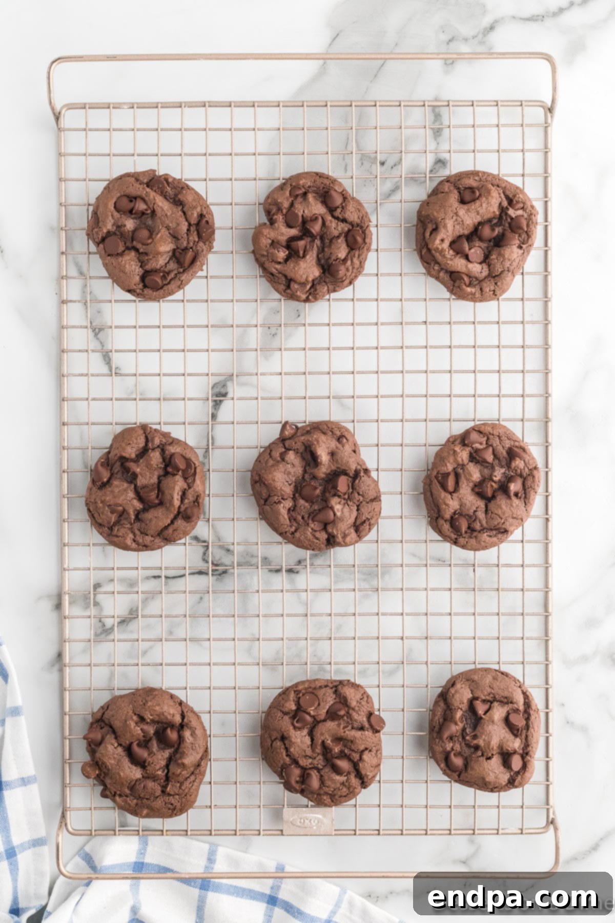 Fudgy Chocolate Cake Mix Cookies 9 Cookies on wire rack cooling.