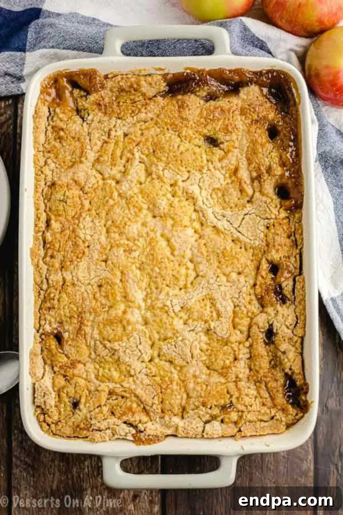The caramel apple dump cake baked to a golden brown perfection in the baking dish.