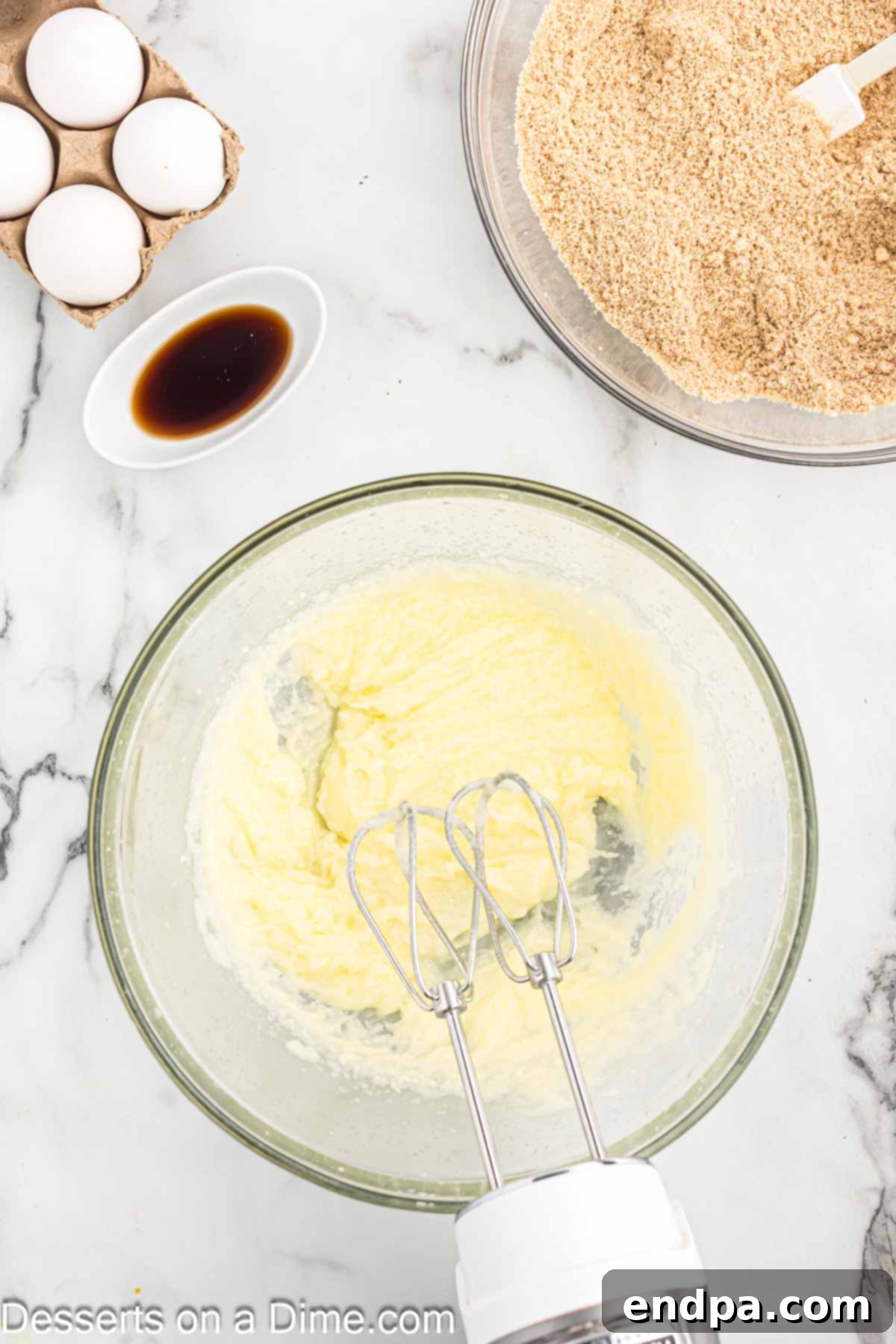 A bowl of butter, coconut oil, and erythritol creamed together until fluffy.