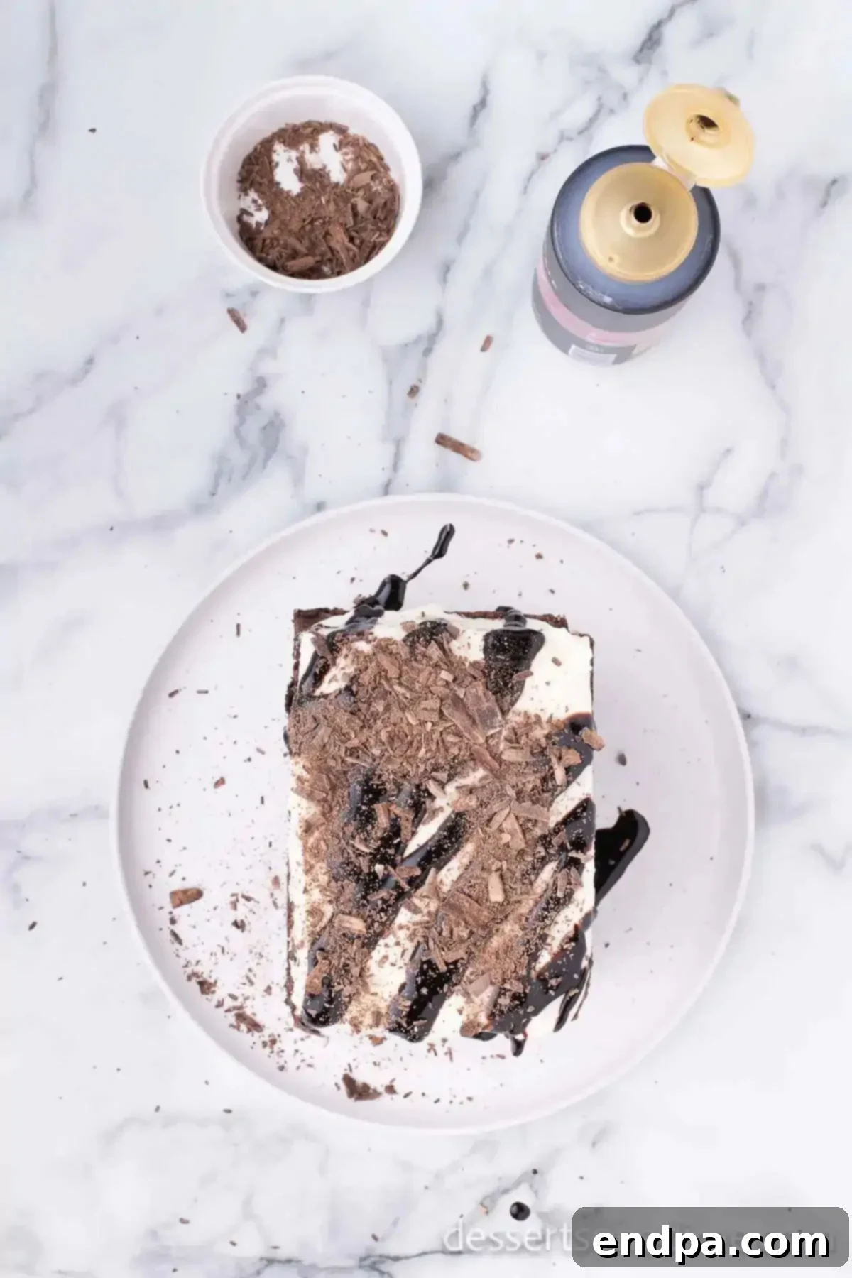 Chocolate drizzle on cake.