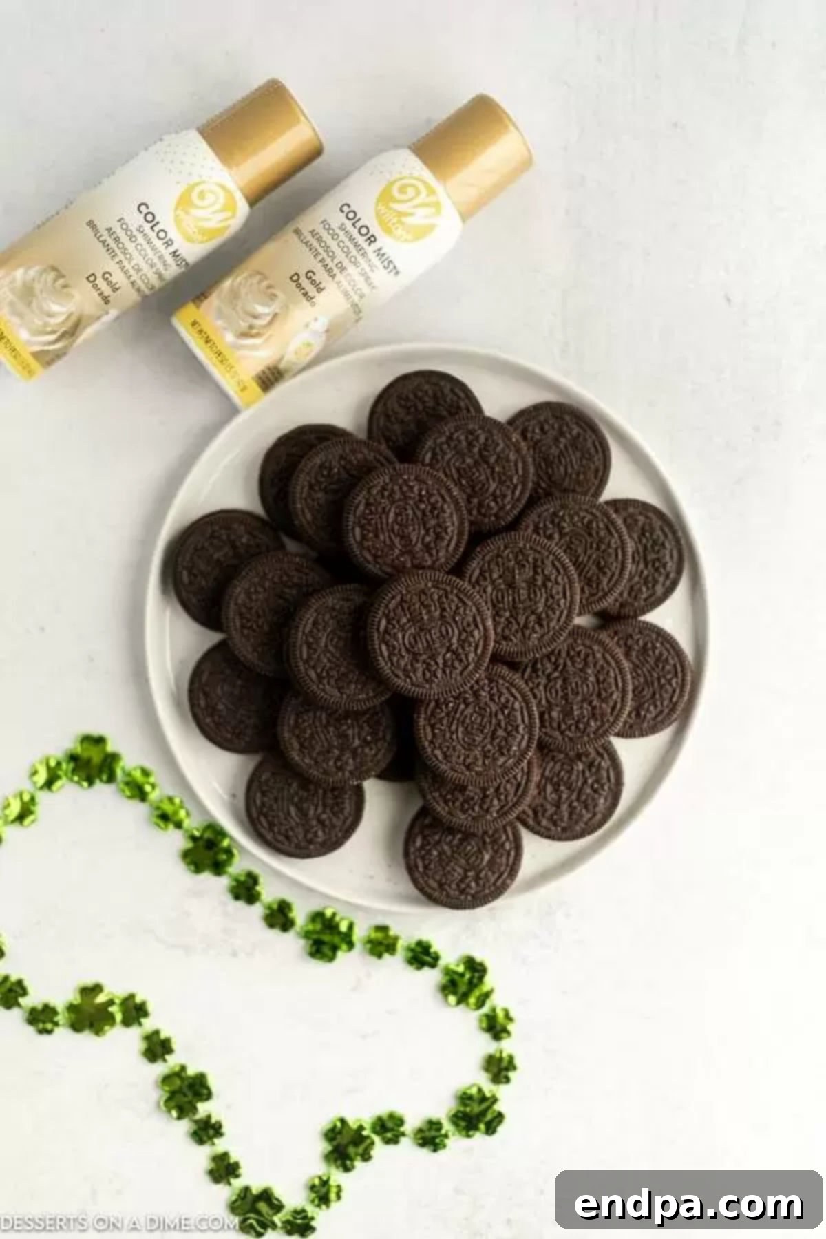 The two simple ingredients for gold Oreos: gold spray and Oreo cookies.