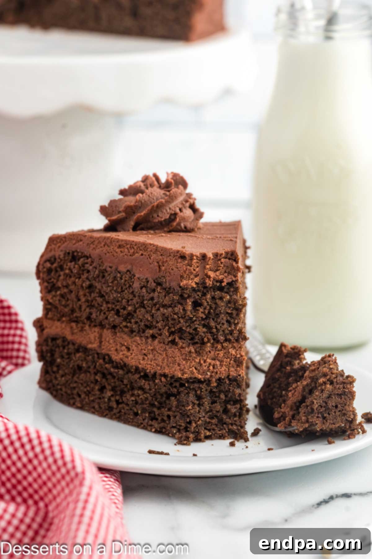 Decadent Keto Chocolate Dream 4 A perfectly baked and frosted slice of Keto Chocolate Cake, presented on a plate, ready to be enjoyed as a guilt-free and delicious dessert.