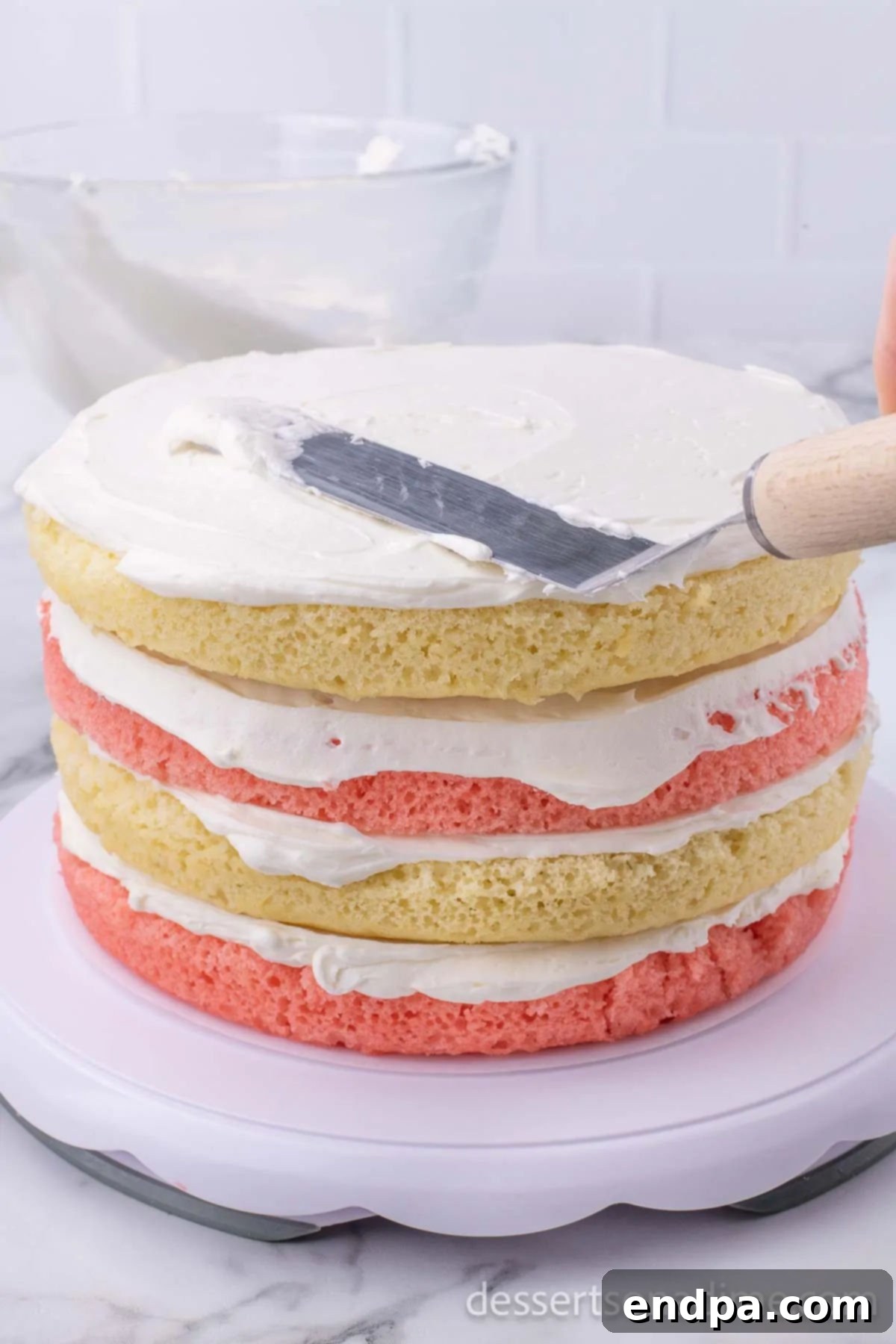 All cake layers stacked with frosting in between.