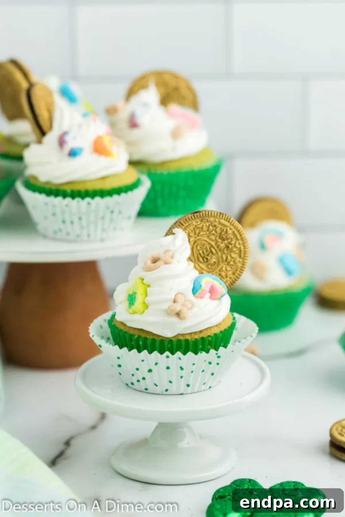 Lucky Green Cupcake Delights 2 St. Patrick's Day cupcakes beautifully arranged on a tiered stand, ready for celebration.