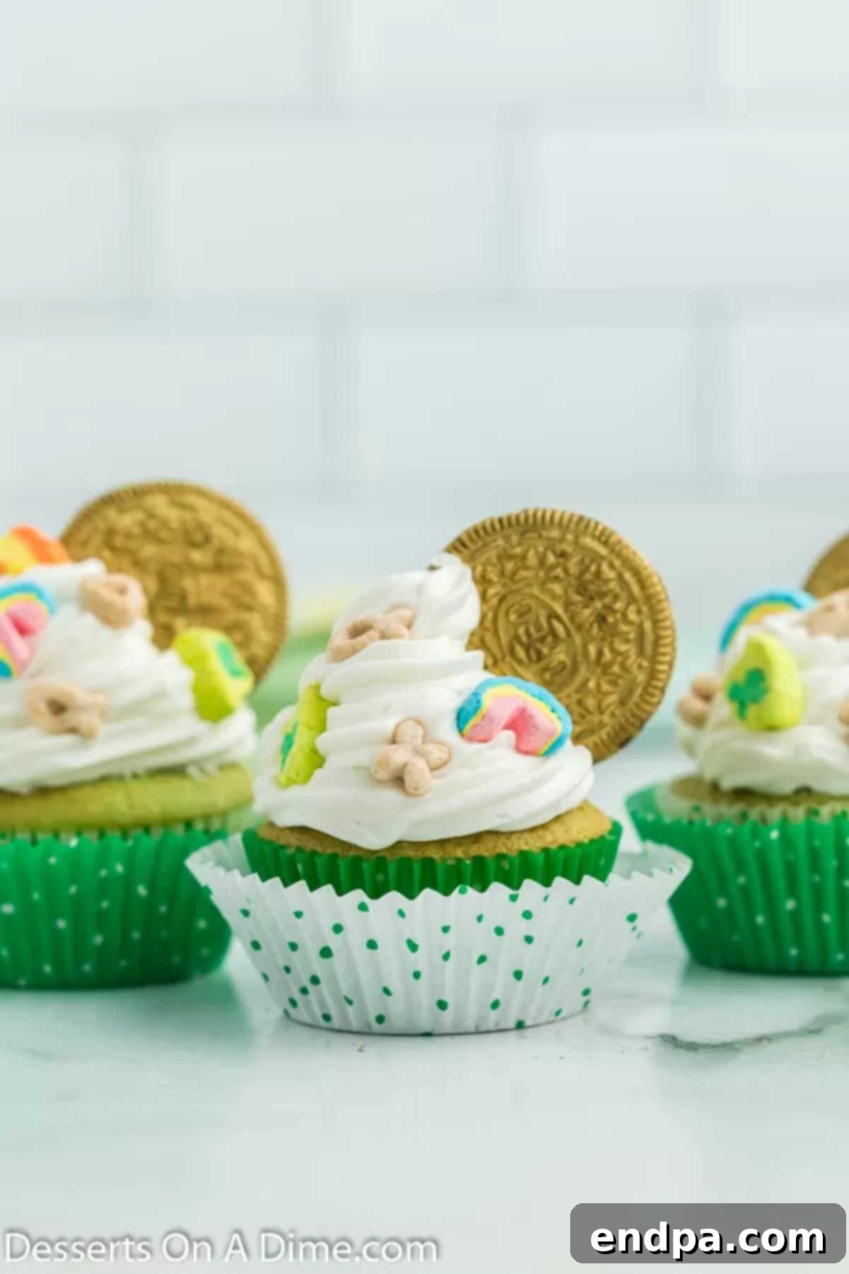Lucky Green Cupcake Delights 10 St. Patrick's Day Cupcakes beautifully arranged together on a flat surface, showcasing their festive decorations.