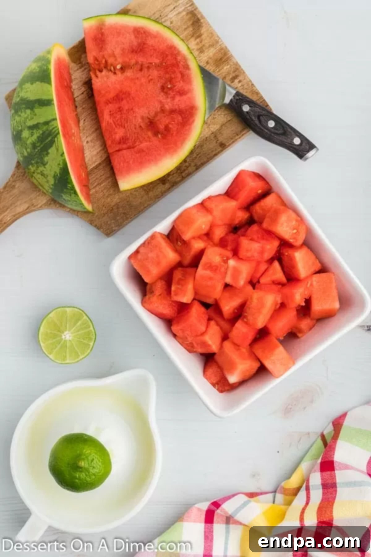 Refreshing Watermelon Ice Pops 3 A simple yet inviting display of the two key ingredients: fresh watermelon chunks and a bright green lime.