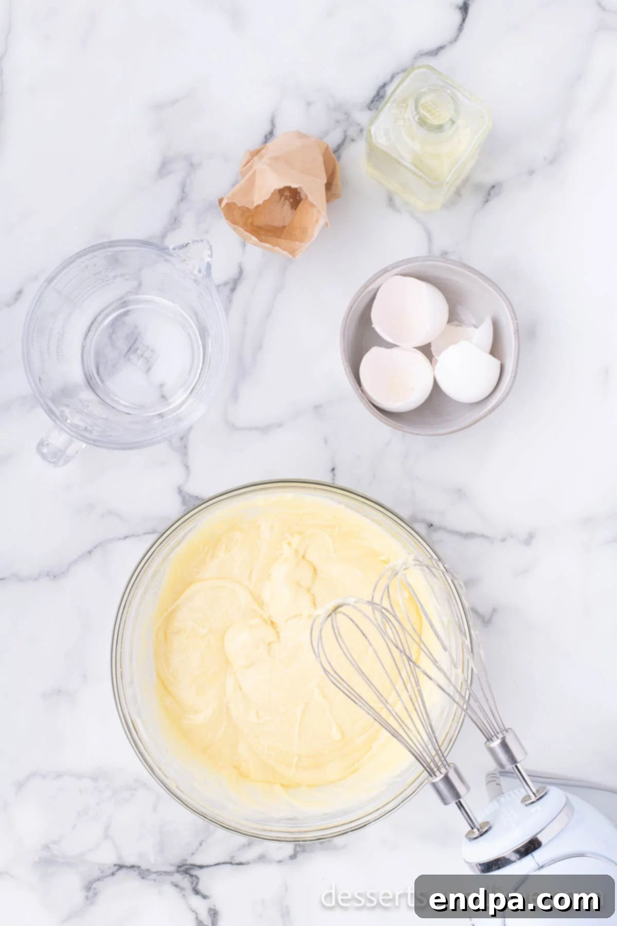Mixing bowl with smooth, combined cake batter.