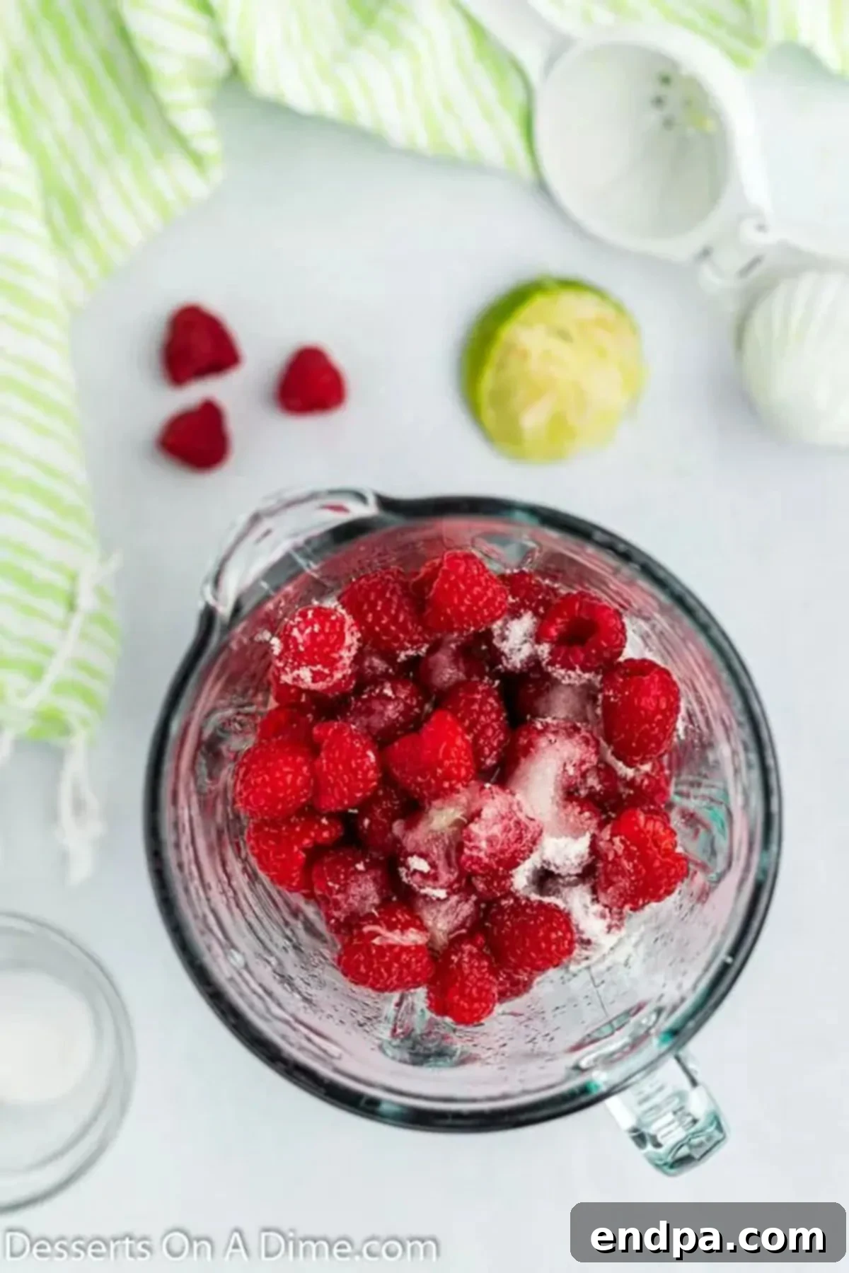 Bursting Berry Bliss: Homemade Raspberry Pops 3 Ingredients in blender.