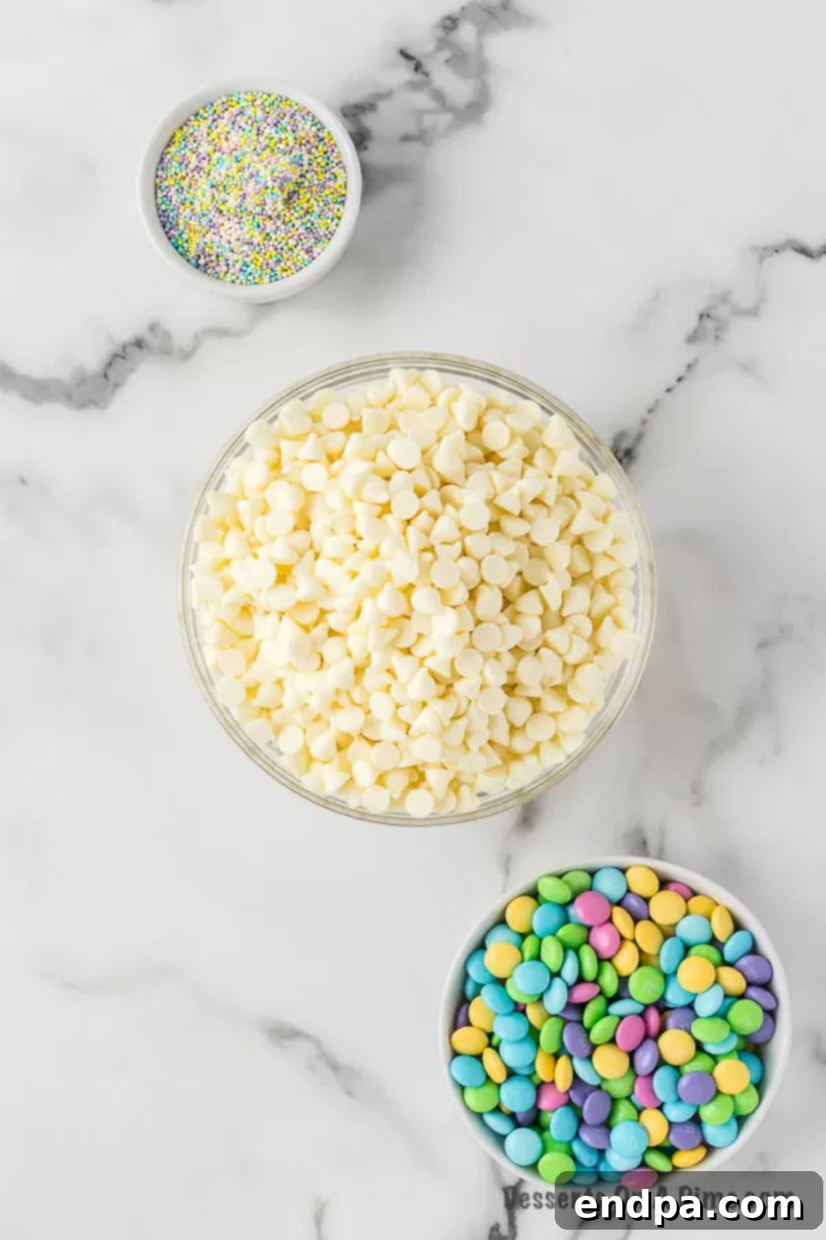 Ingredients needed - white chocolate chips, easter candy, and pastel sprinkles