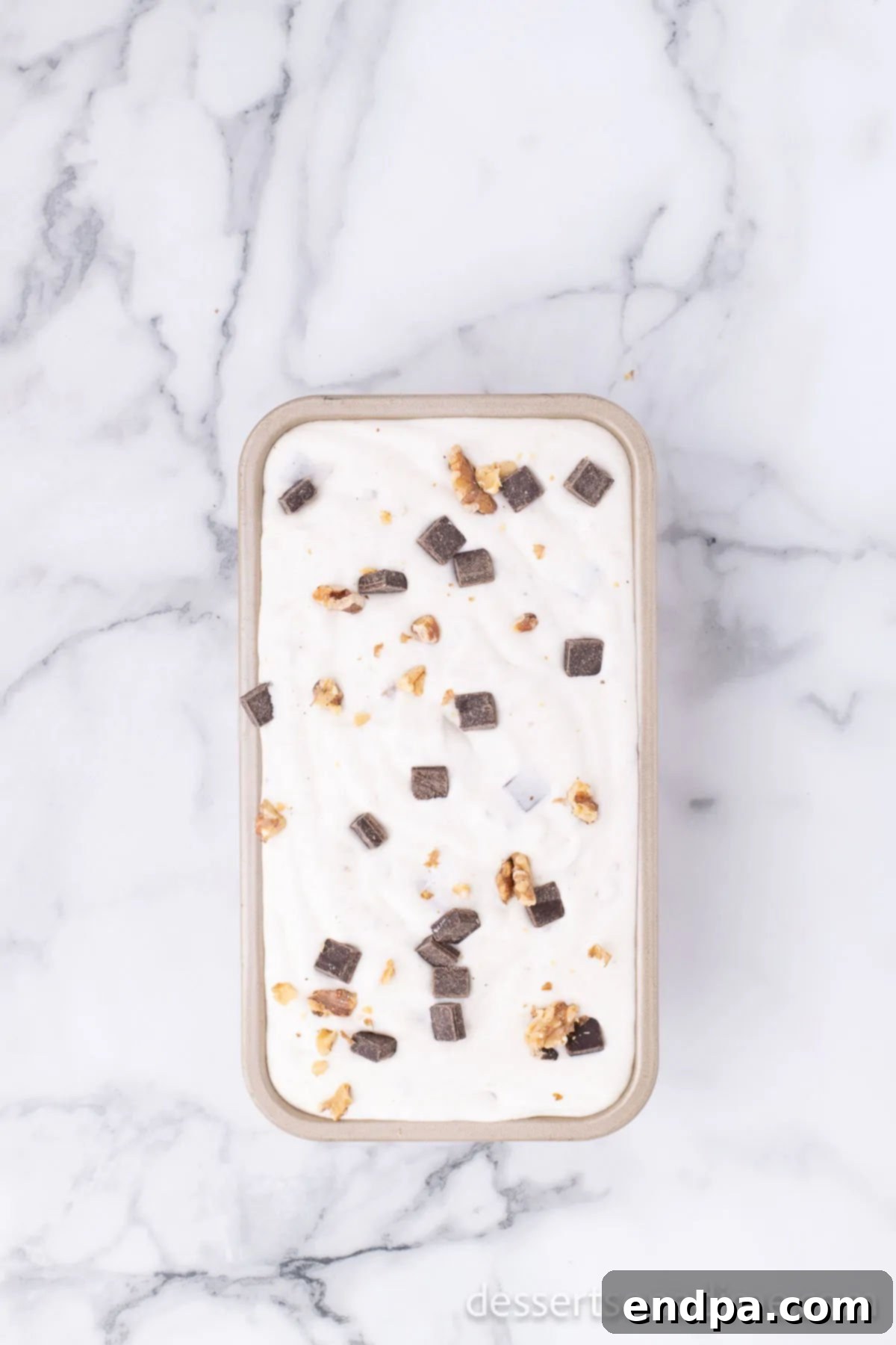 Banana Nut Fudge Frenzy 8 Ice cream mixture spread into loaf pan.