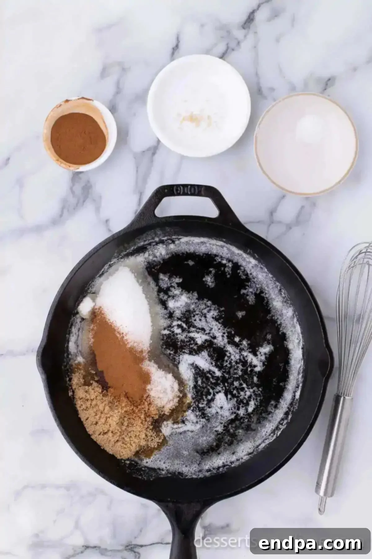 Brown sugar and melted butter combined in a skillet, creating a rich sauce base.