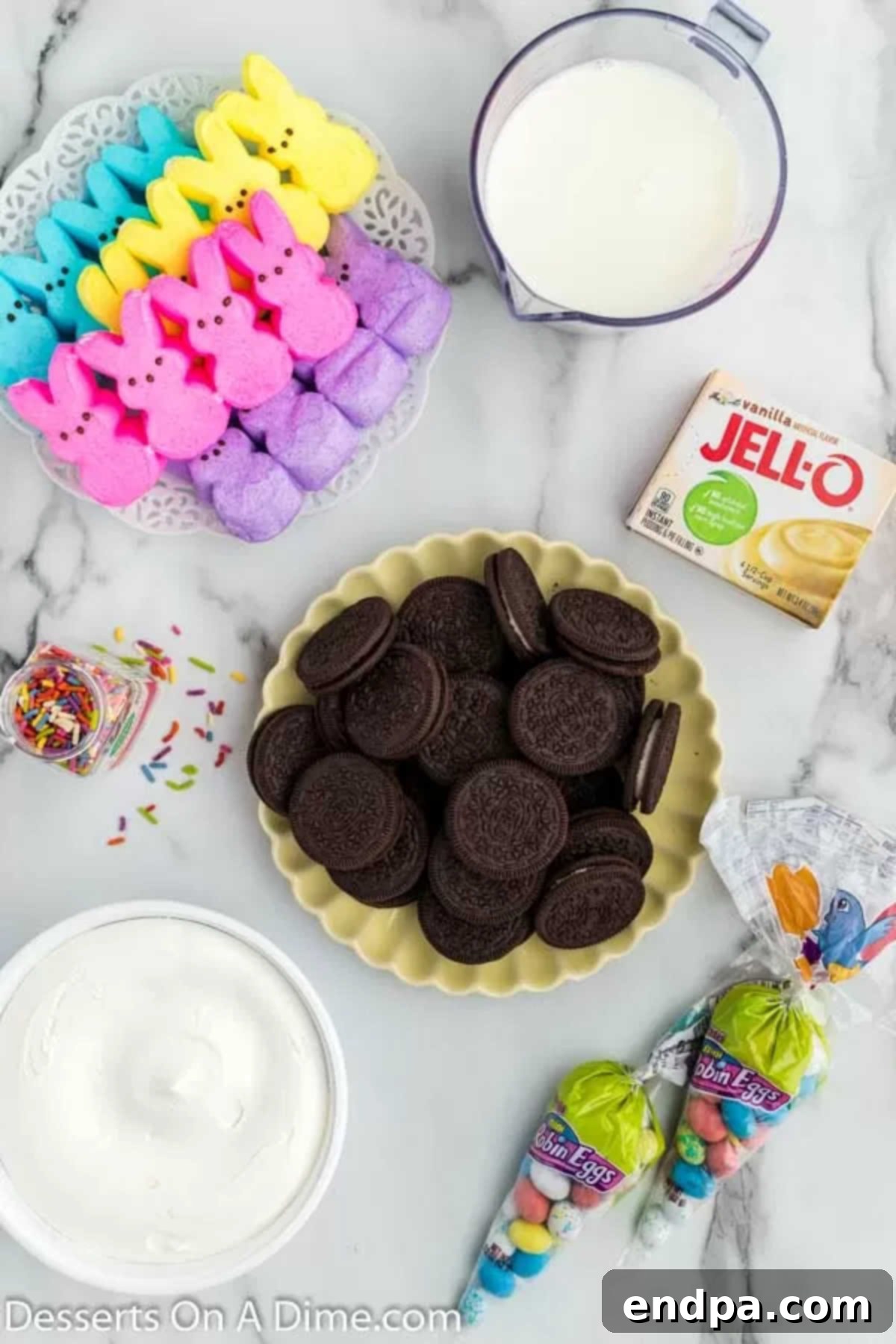 Easter Bunny Burrow Cups 3 Ingredients for recipe: peeps, pudding, milk, oreo cookies, candy, sprinkles, whipped topping.