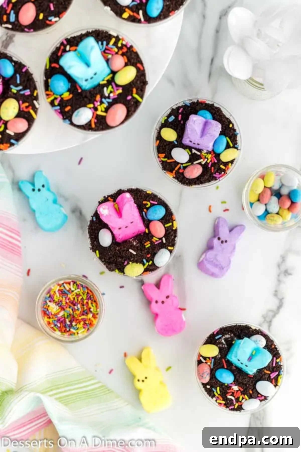 Easter Bunny Burrow Cups 9 Cups with peeps and candy on top.