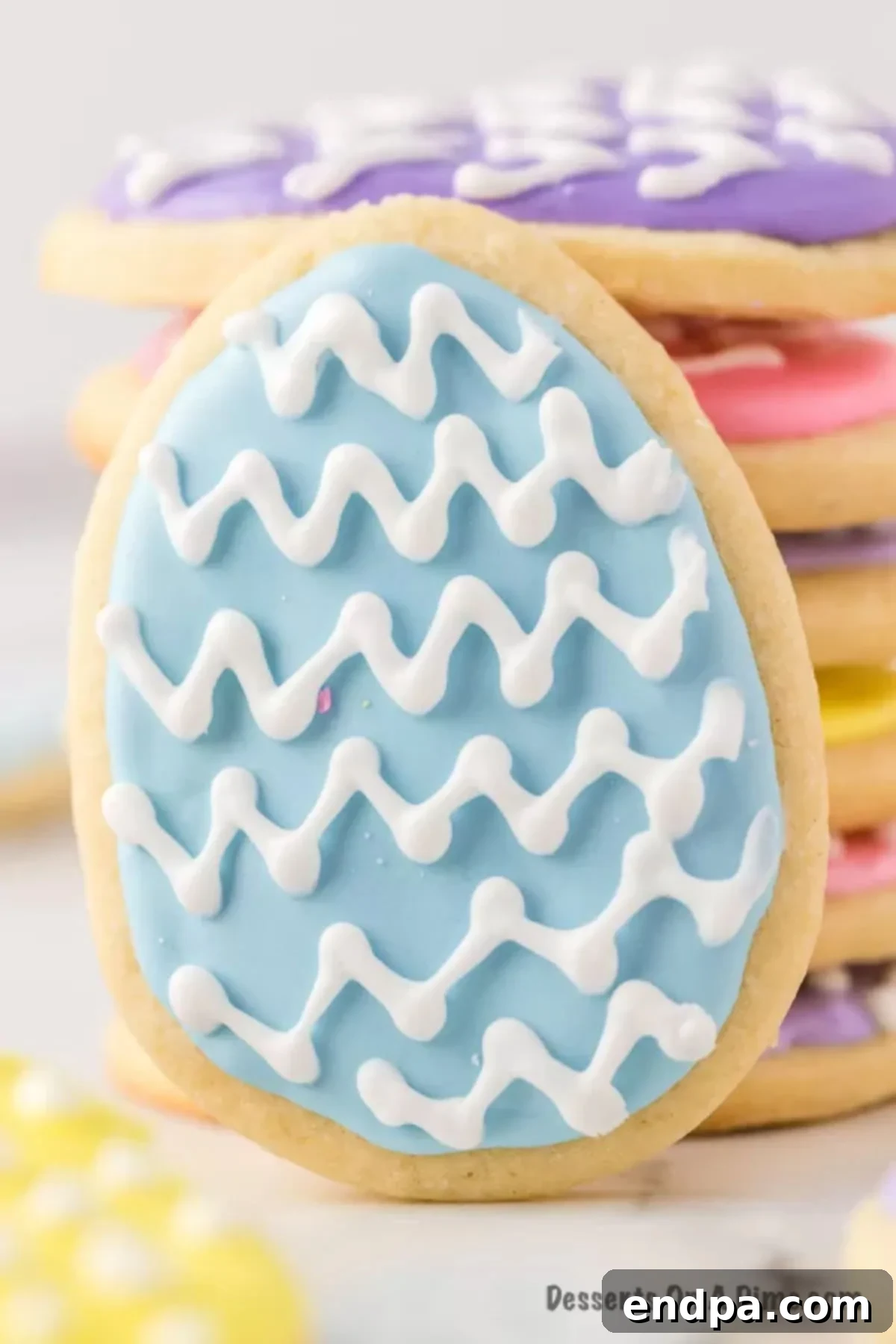 Stack of Easter egg Sugar Cookies decorated. 