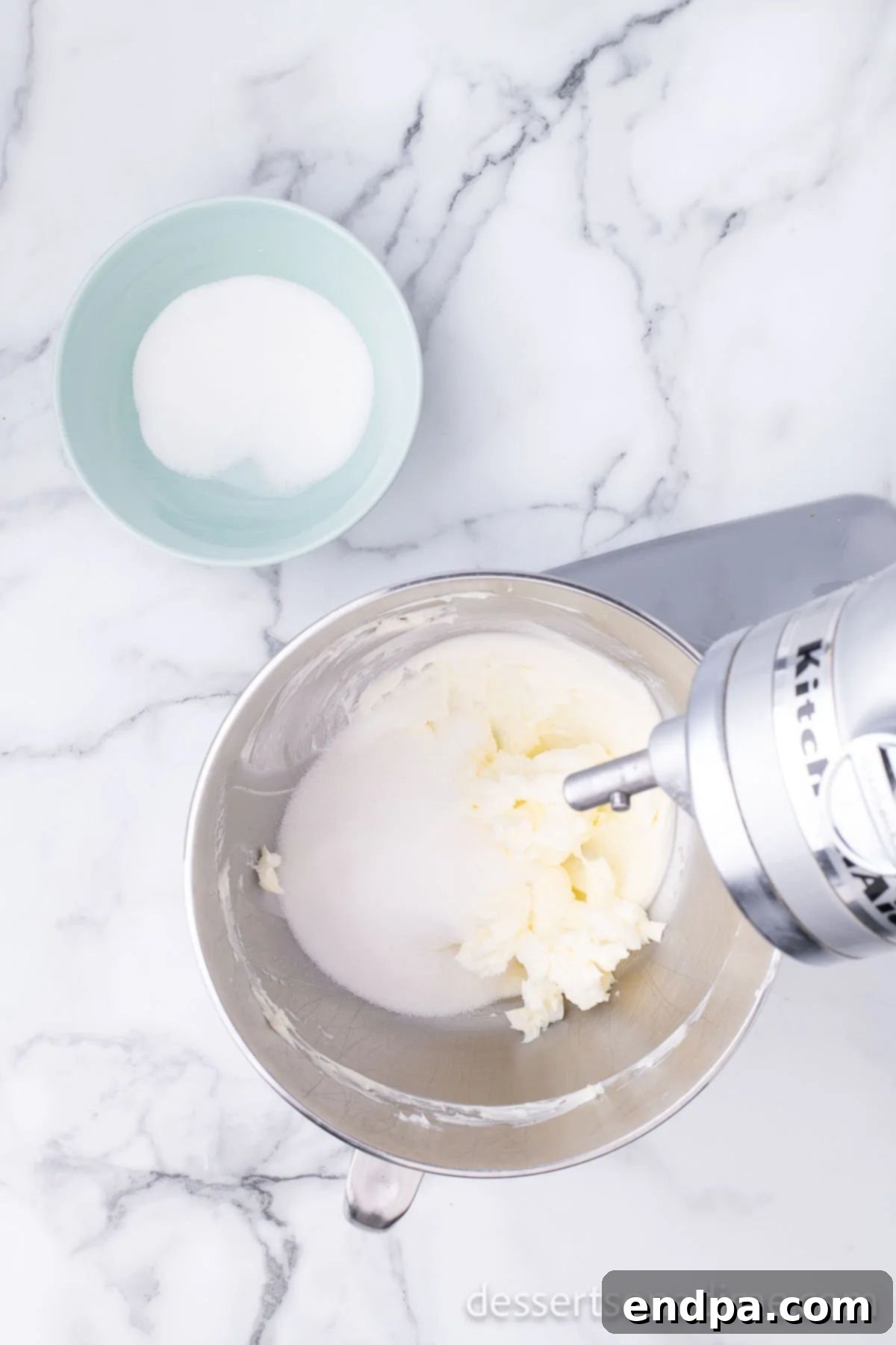 Butter and sugar being creamed together. 