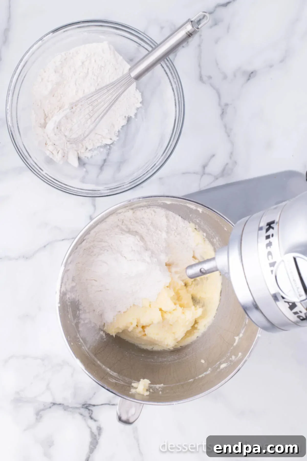 Wet and dry ingredients combined together in a bowl. 